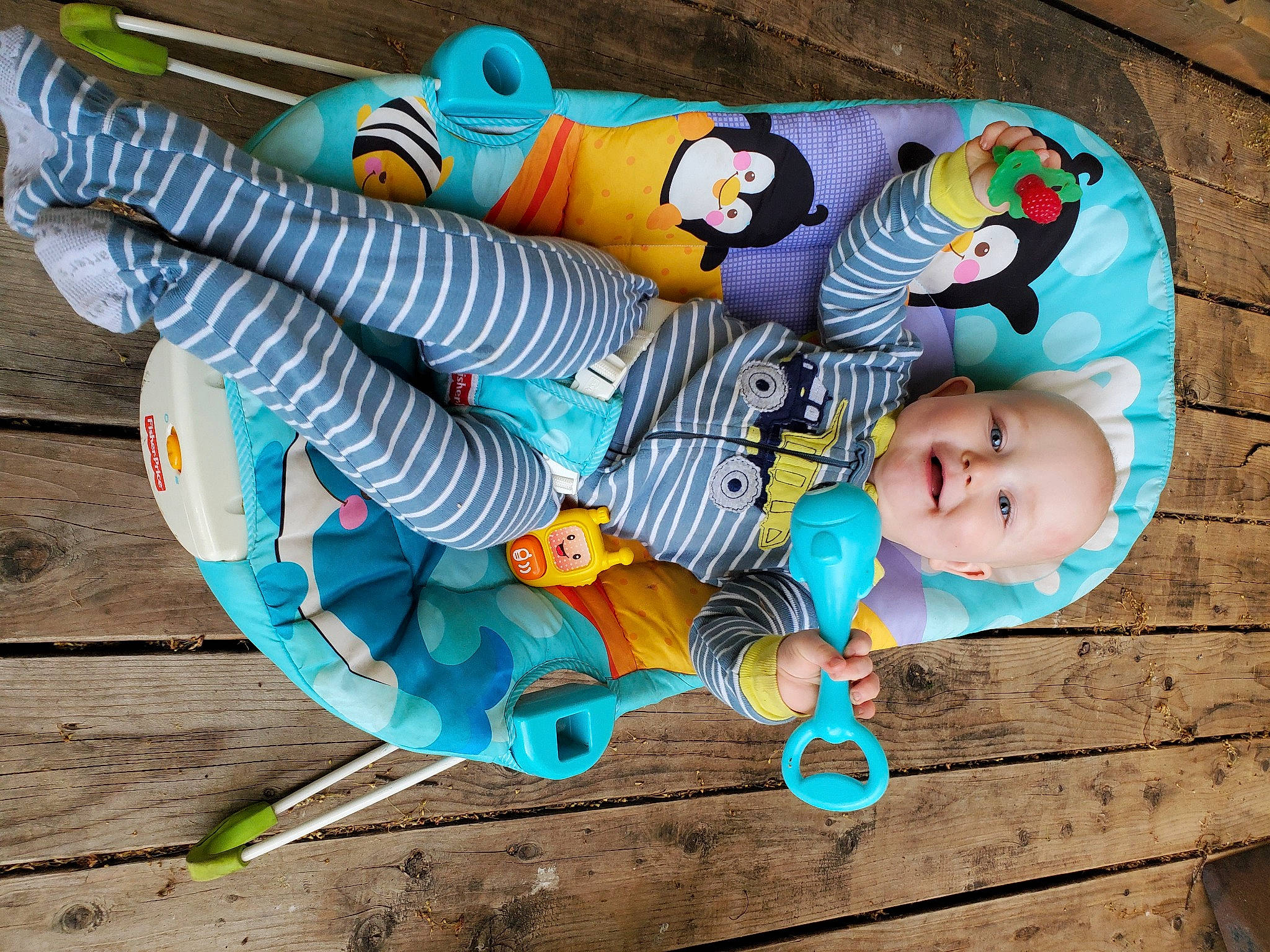 Linkin is registered to the contest to win money with this photo: art, baby, baby_products, baby_toddler_clothing, baby_toys, blue, child, fashion_accessory, happy, joy, leisure, linens, pattern, person, sitting, toddler, toy, visual_arts, wood