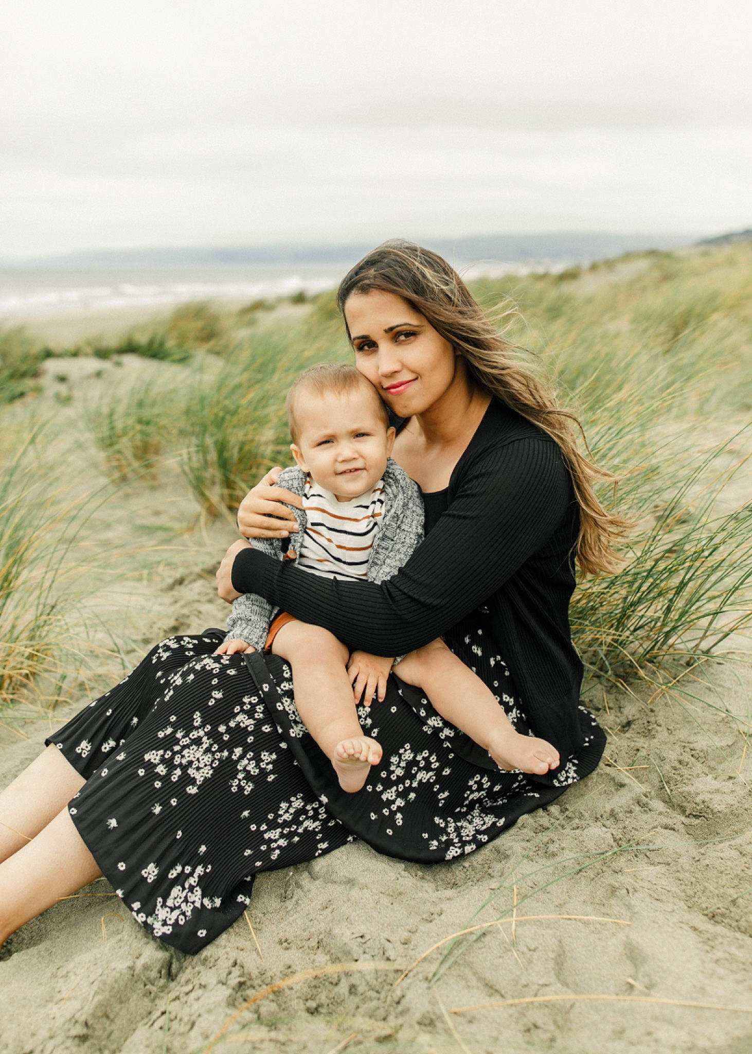Cole is registered to the contest to win money with this photo: baby, beach, blond, child, flash_photography, fun, grass, grassland, happy, joy, landscape, love, monochrome_photography, people_in_nature, person, prairie, rock, sand, sitting, sky