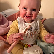 Addison joined the competition — help win amazing prizes! baby, babylaughing, baton, bodypart, brush, cutlery, device, face, finger, hand, happy, head, medication, person, photography, pill, portrait, smile, spoon, stick