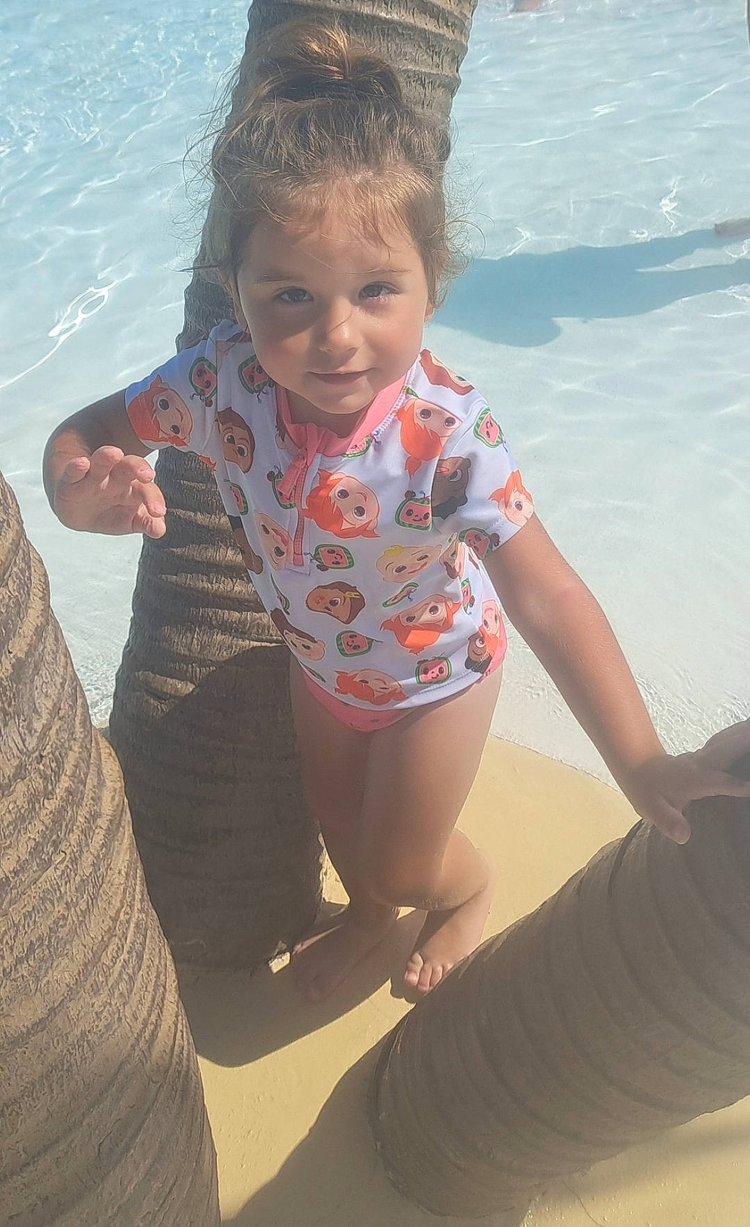 Kadia is registered to the contest to win money with this photo: arm, body_of_water, fun, hairstyle, hand, happy, human_body, joint, leg, leisure, mammal, organ, people_in_nature, people_on_beach, person, skin, smile, standing, thigh, vertebrate