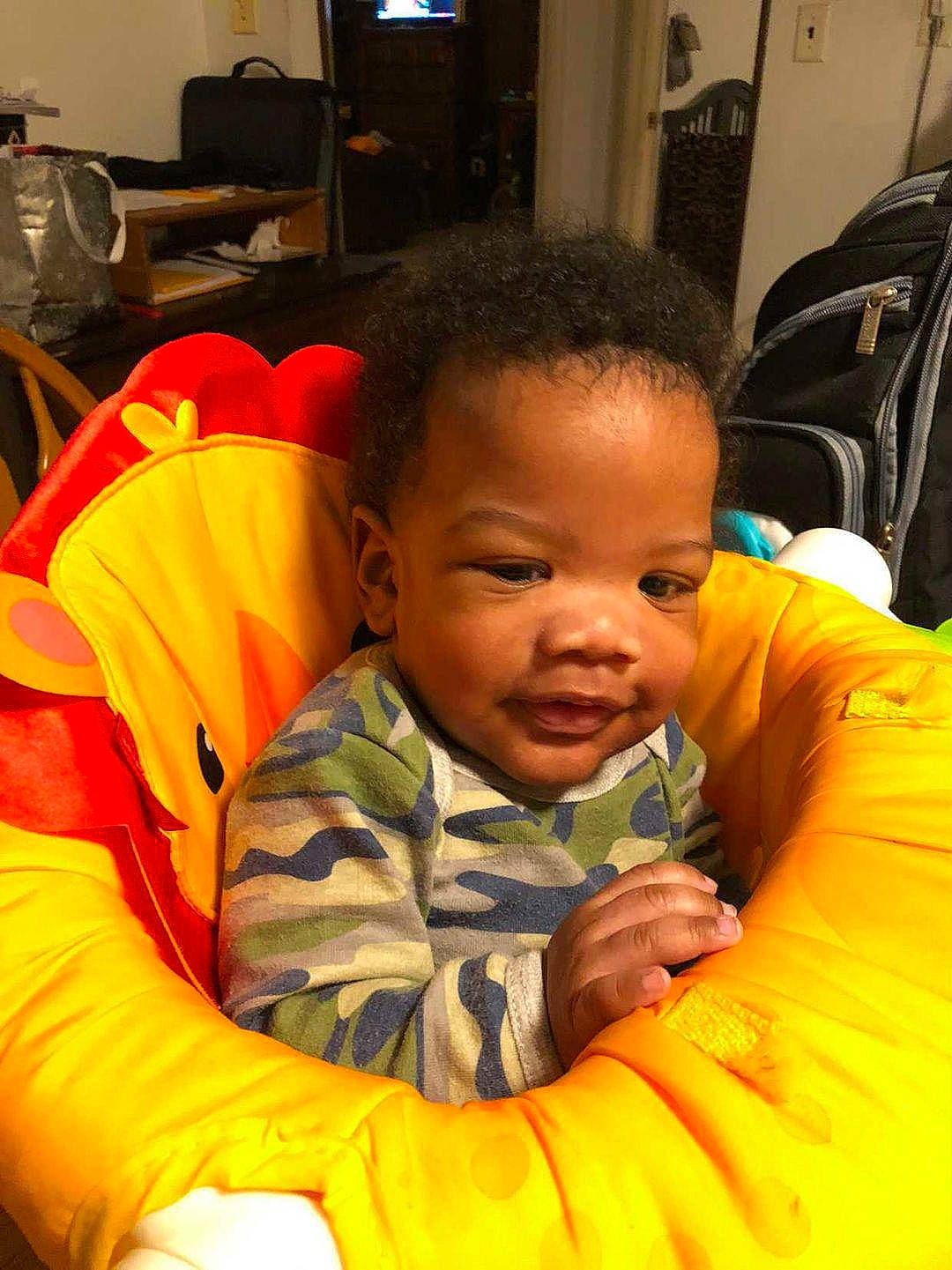 Xavian joined the competition — help win amazing prizes! baby, baby_toddler_clothing, buzz_cut, car_seat, chair, child, comfort, computer_keyboard, computer_monitor, facial_expression, fun, happy, iris, nose, person, room, sitting, smile, toddler, vacation
