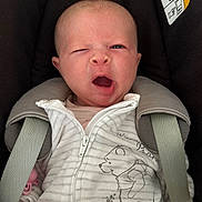 Lucia participe au concours pour gagner de l'argent avec cette photo : baby, car_seat, casual, child, closeup, clothing, cute, expression, face, indoor, infant, person, portrait, seatbelt, sleepy, straps, wearing, winnie_the_pooh, yawning, young