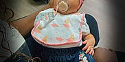 Camryn joined the competition — help win amazing prizes! baby, baby_car_seat, bib, clothing, cozy, cute, denim_jeans, embroidery, flooring, hand, headband, holding, indoor, infant, pacifier, person, pink, polka_dot, sleeping, sock