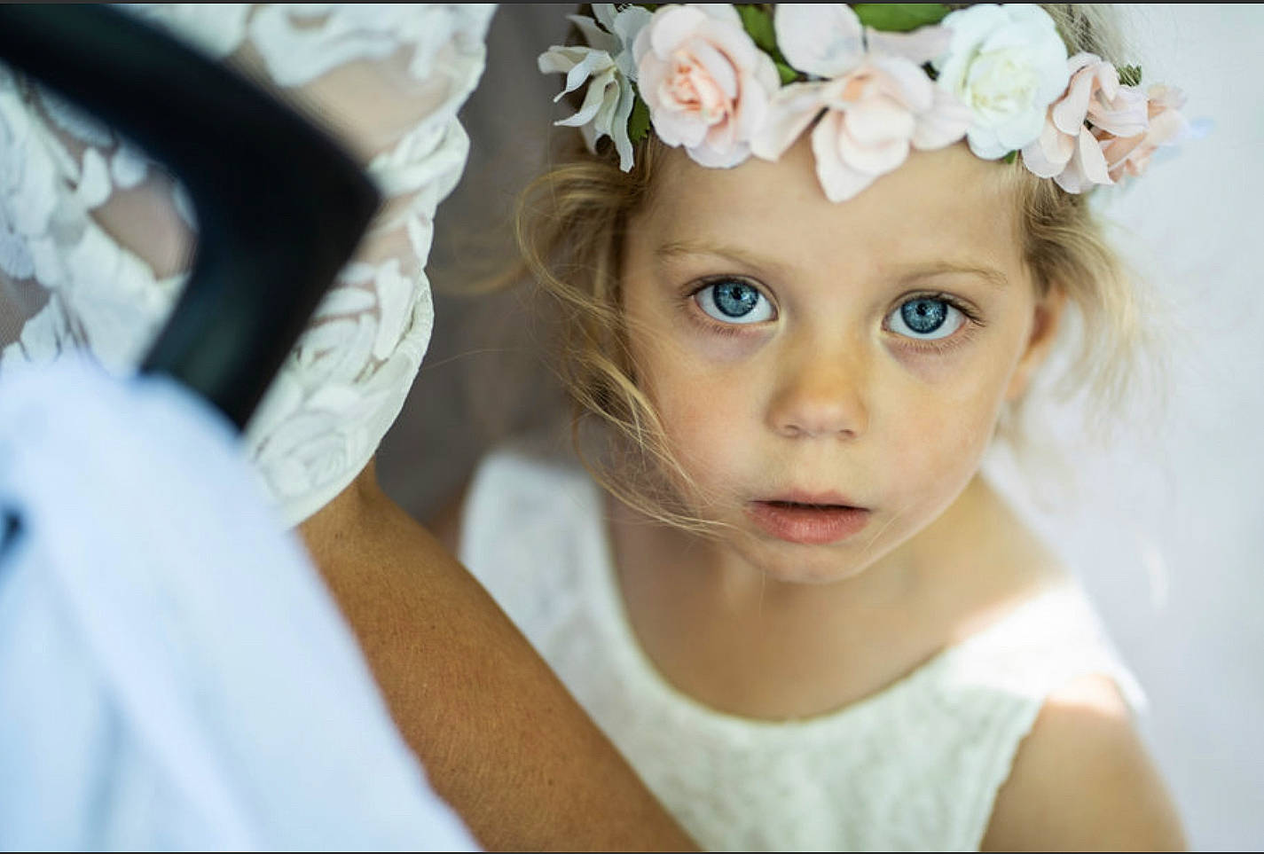 Jude participe au concours pour gagner de l'argent avec cette photo : blond, bridal_accessory, brown_hair, child, dress, embellishment, eyebrow, eyelash, flash_photography, flower, happy, headband, headpiece, headwear, iris, jewellery, long_hair, person, petal, tiara