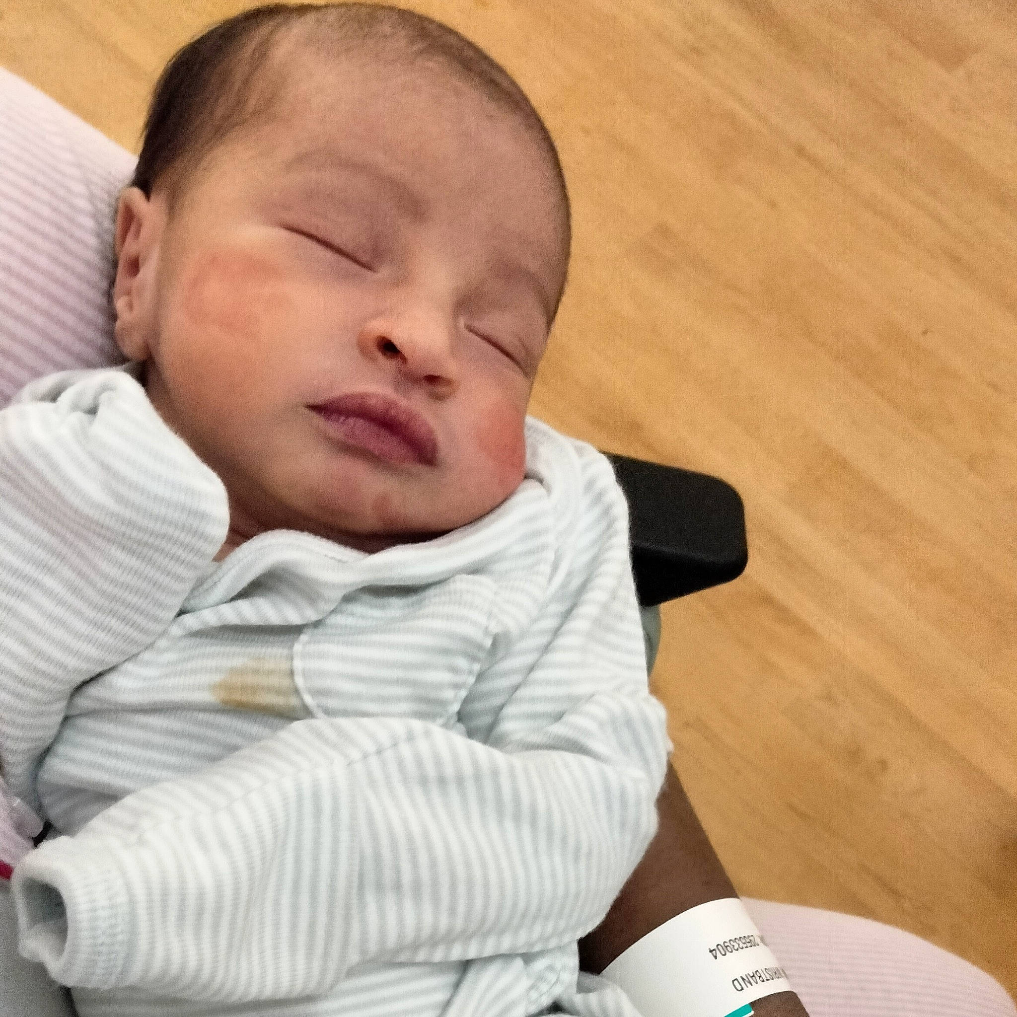 Iyla is registered to the contest to win money with this photo: baby, baby_products, baby_sleeping, baby_toddler_clothing, cheek, child, comfort, finger, flooring, happy, hardwood, nose, person, skin, sleeve, toddler, toy, varnish, wood, wood_flooring