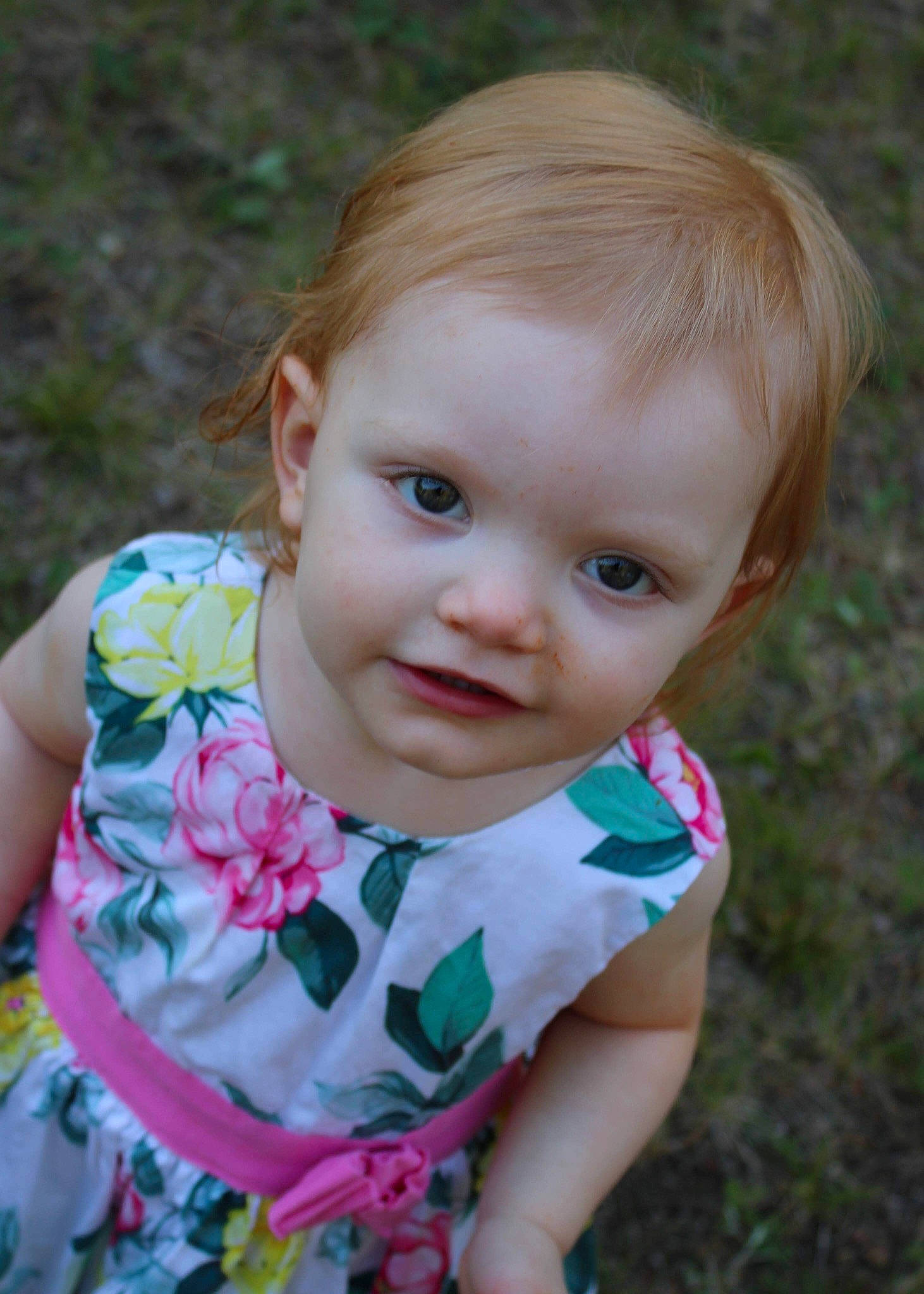 Novaleigh is registered to the contest to win money with this photo: baby_toddler_clothing, cheek, child, chin, dress, eye, grass, happy, head, human, iris, leaf, lip, nose, people_in_nature, person, pink, plant, skin, smile