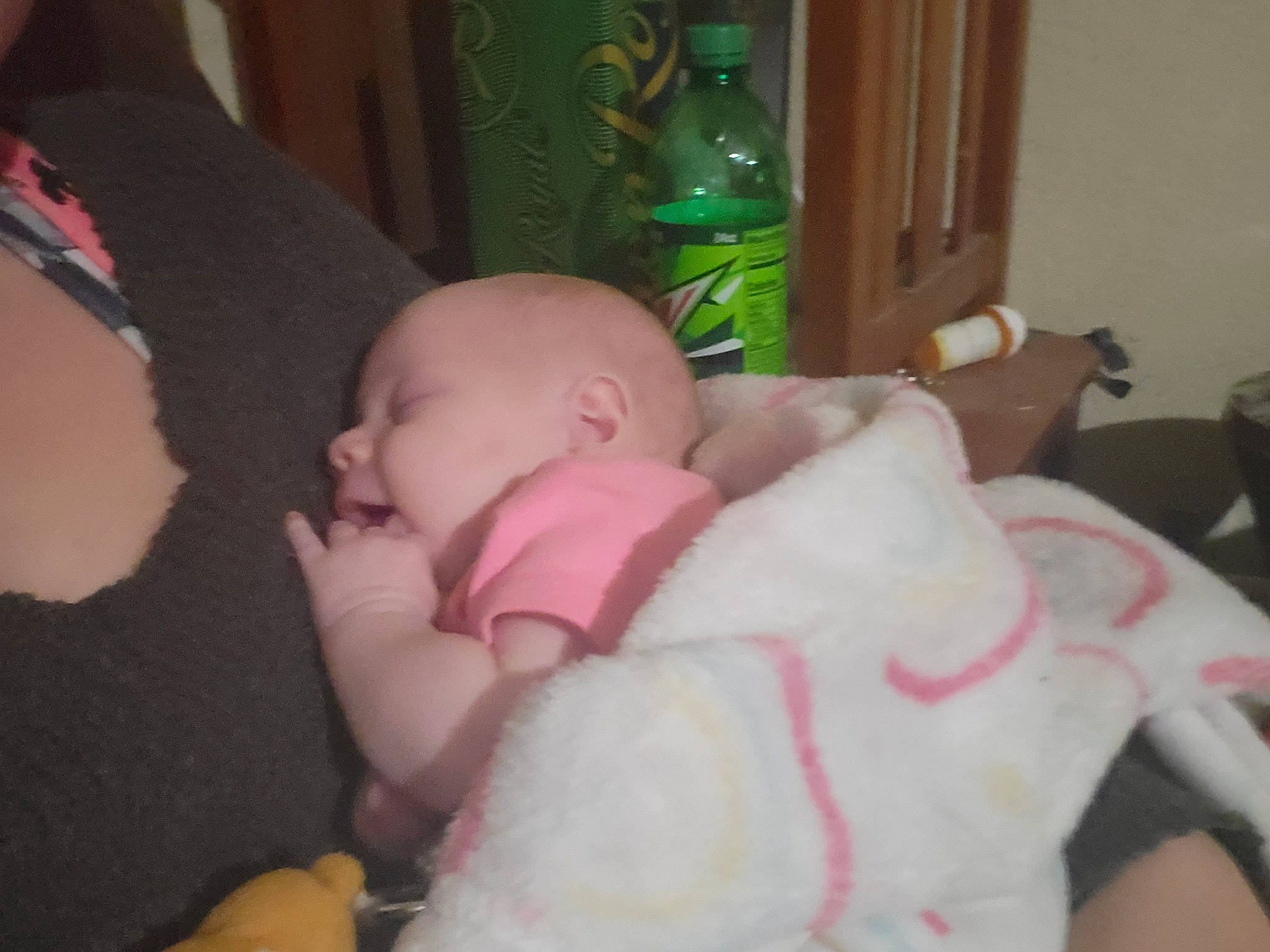 Adalynn is registered to the contest to win money with this photo: baby, baby_products, baby_toddler_clothing, bottle, cheek, child, comfort, ear, finger, fun, iris, lap, nail, person, room, sitting, skin, thumb, toddler, water_bottle