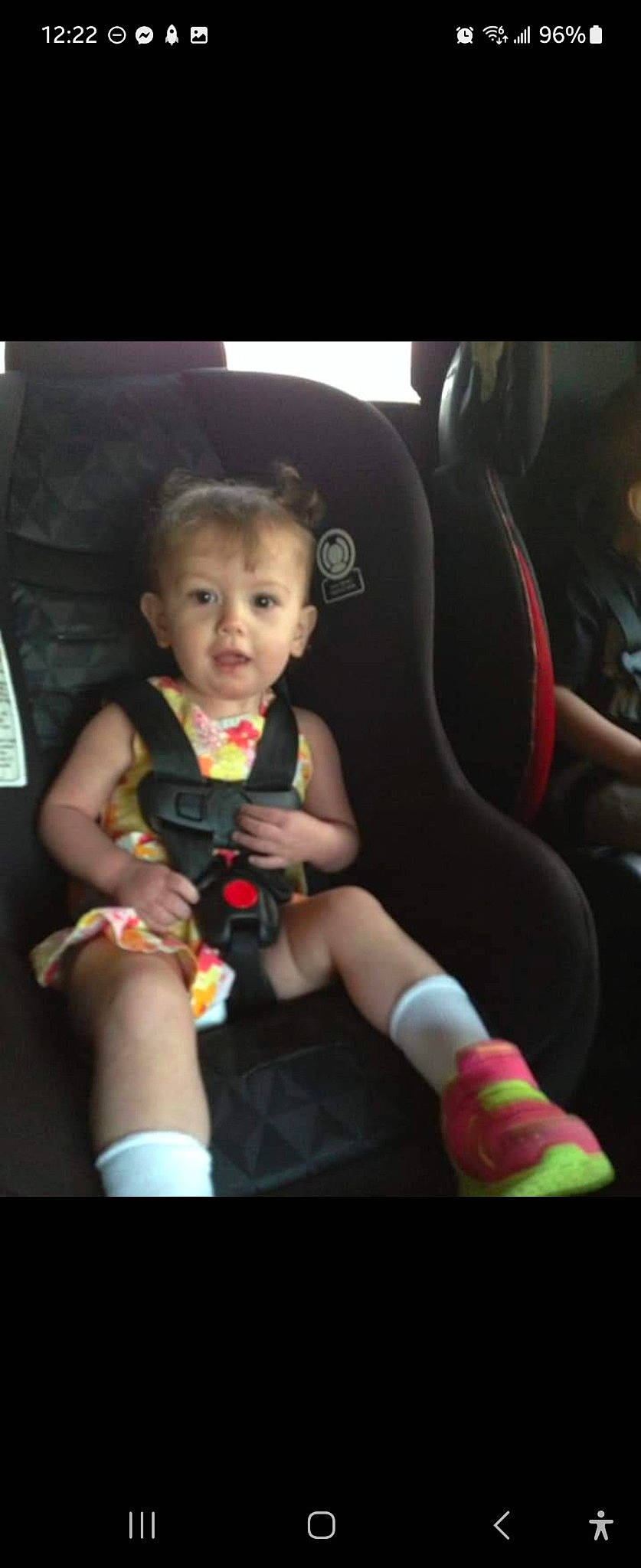 Serenity is registered to the contest to win money with this photo: auto_part, baby, baby_toddler_clothing, car_seat, car_seat_cover, child, comfort, dress, flash_photography, fun, happy, head_restraint, human_body, human_leg, lap, nail, person, seat_belt, steering_wheel, thigh