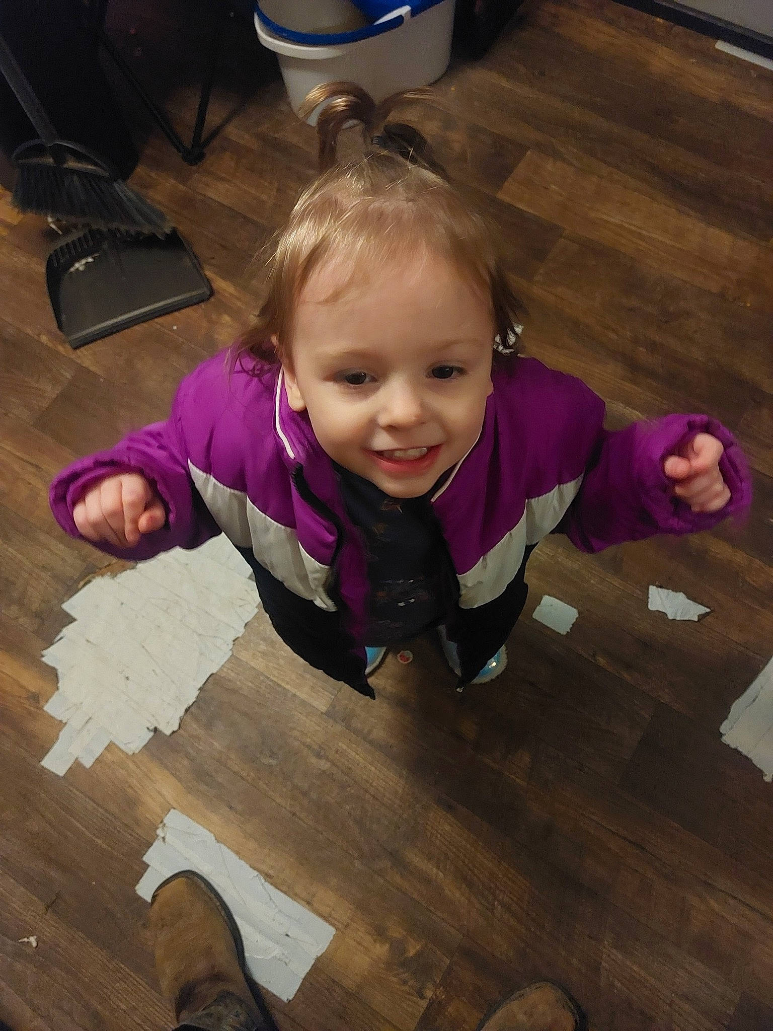 Kayleigh joined the competition — help win amazing prizes! baby_toddler_clothing, brown, cheek, child, facial_expression, floor, flooring, fun, hairstyle, happy, hardwood, joy, leisure, person, purple, sitting, skin, smile, toddler, varnish