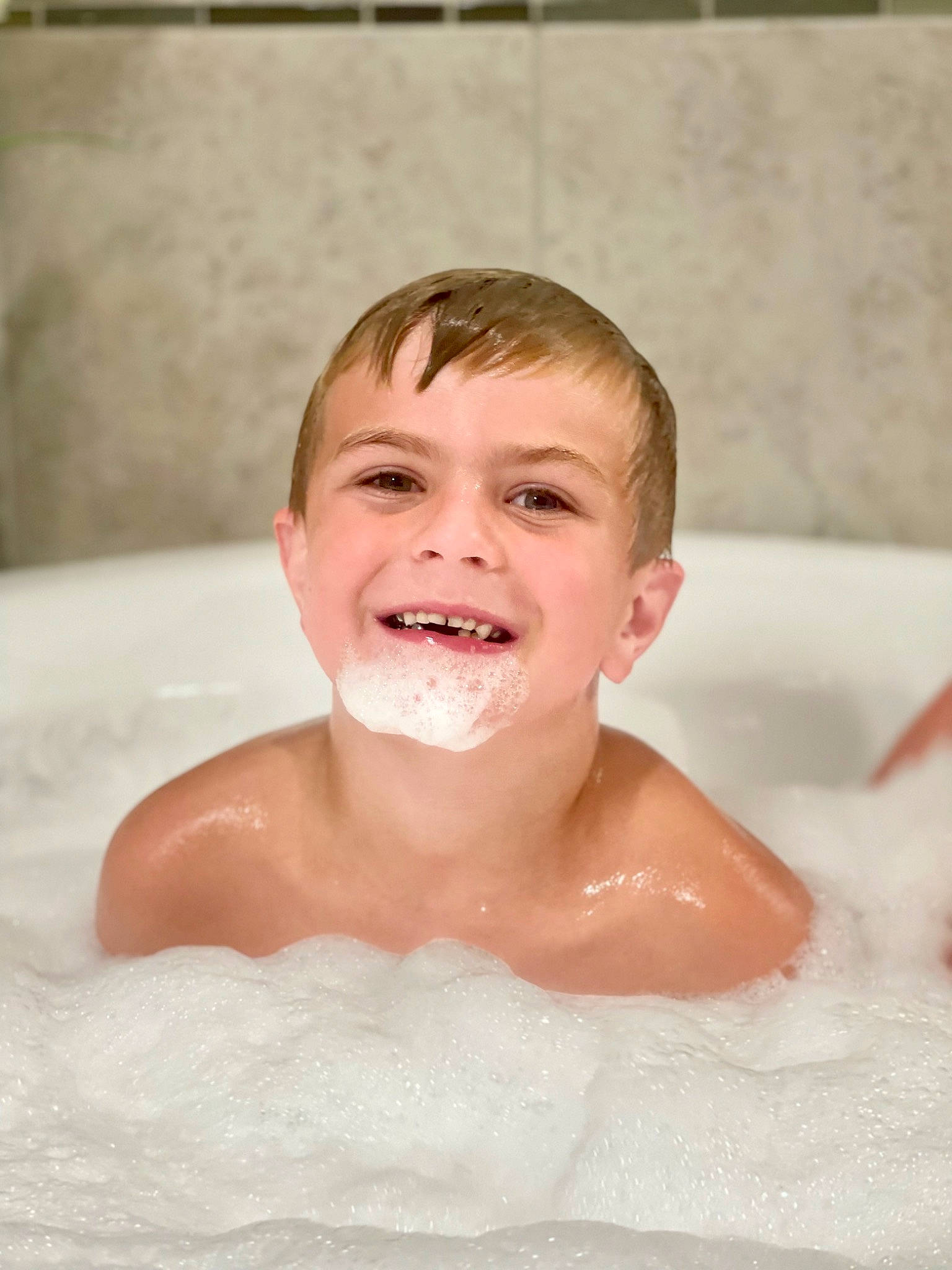 Lawson is registered to the contest to win money with this photo: bathing, bathroom, bathtub, chin, composite_material, eye, eyebrow, eyelash, fluid, foam, fun, hairstyle, happy, jaw, joy, leisure, liquid, person, plumbing, skin