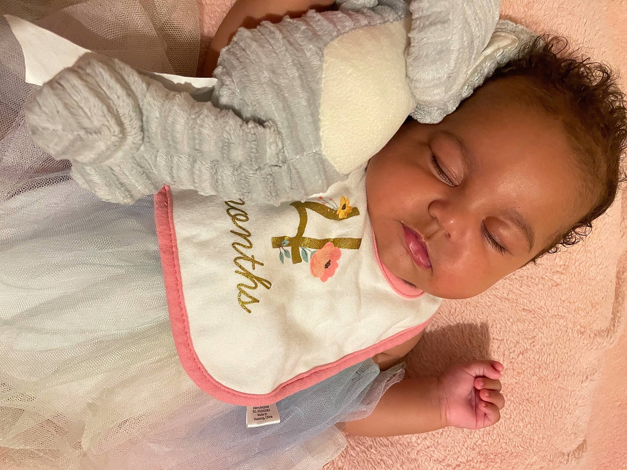 Charleigh is registered to the contest to win money with this photo: arm, baby, baby_sleeping, baby_toddler_clothing, cheek, child, comfort, eyebrow, eyelash, finger, gesture, happy, linens, lip, mouth, neck, nose, person, skin, sleeve