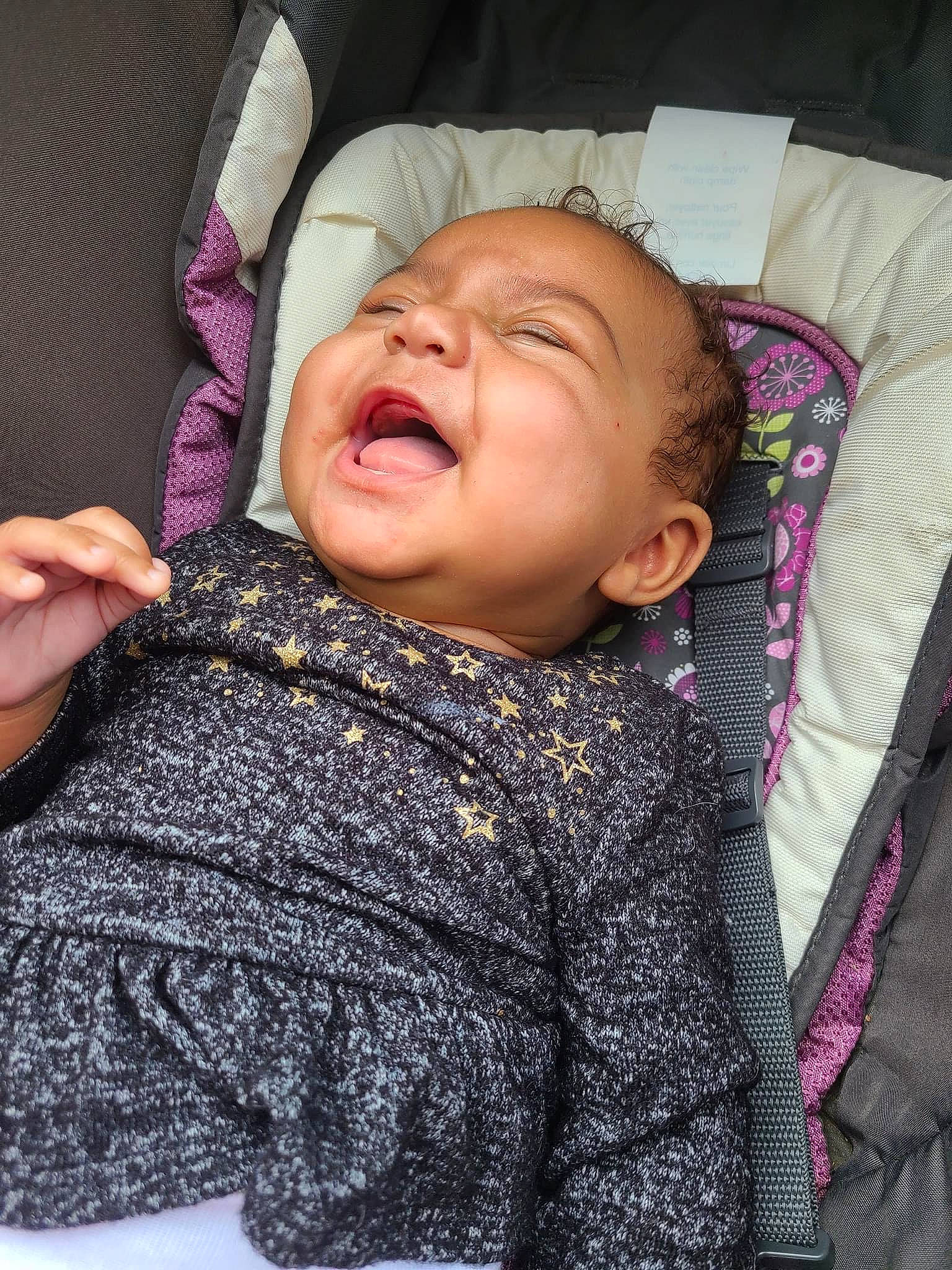 Charleigh is registered to the contest to win money with this photo: baby_toddler_clothing, cheek, chin, comfort, eye, eyebrow, face, happy, human_body, iris, lip, mouth, neck, nose, outerwear, person, purple, skin, sleeve, smile