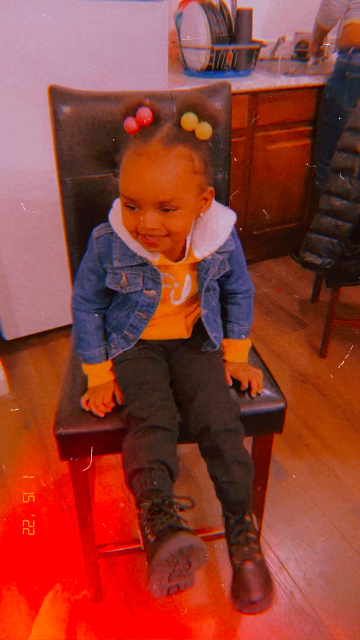 Amyra is registered to the contest to win money with this photo: baby_toddler_clothing, cabinetry, chair, child, drawer, electric_blue, flooring, fun, furniture, happy, hardwood, joy, leisure, orange, person, room, sitting, smile, standing, toddler