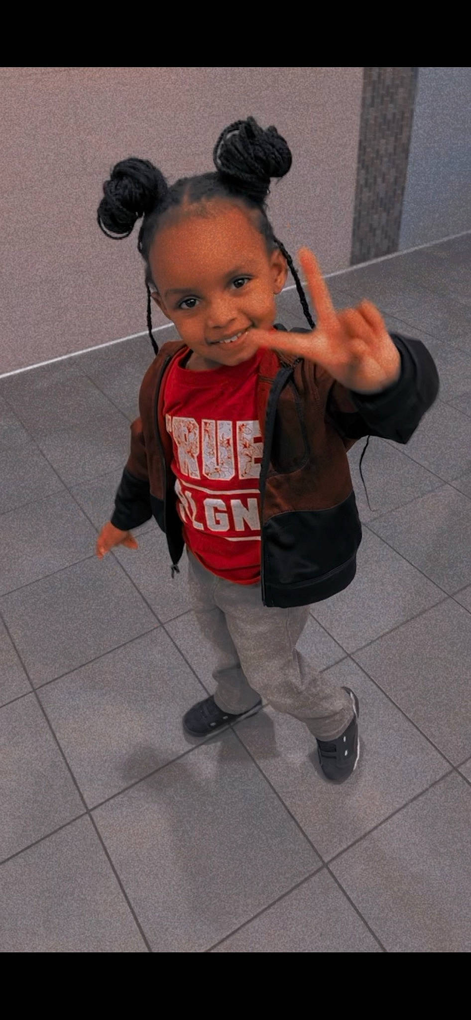 Amyra is registered to the contest to win money with this photo: child, event, eye, face, flooring, forehead, fun, hair, hand, happy, head, human_leg, joy, leg, person, sleeve, smile, sneakers, sportswear, t_shirt