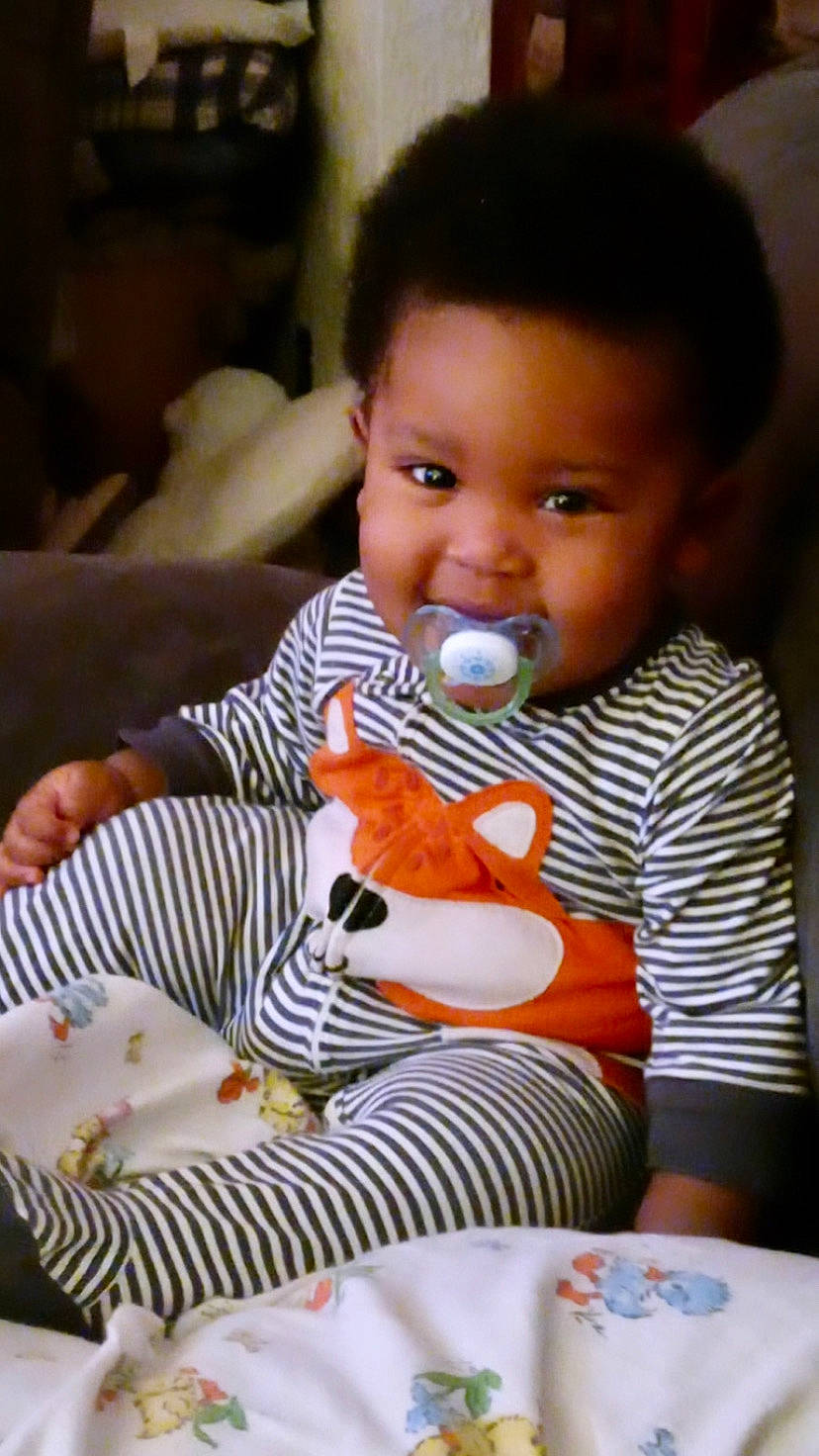 Coby joined the competition — help win amazing prizes! baby, baby_toddler_clothing, chair, cheek, child, drinkware, eye, face, fun, happy, head, iris, linens, nose, person, plate, room, sitting, t_shirt, tableware