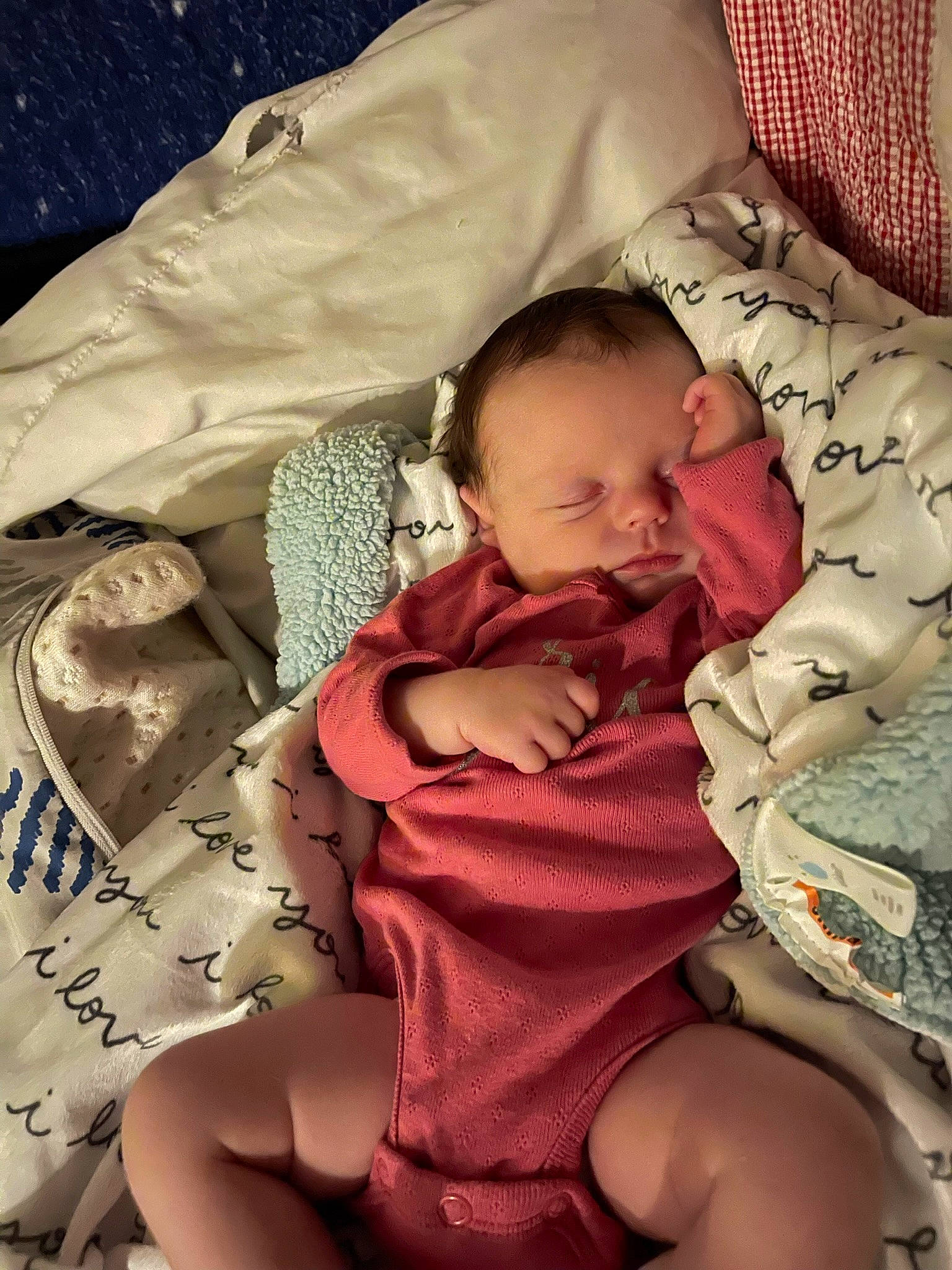 Lyrica is registered to the contest to win money with this photo: baby, baby_toddler_clothing, cheek, comfort, eye, face, facial_expression, finger, hairstyle, hand, head, human, human_body, lap, mammal, mouth, person, pink, product, skin