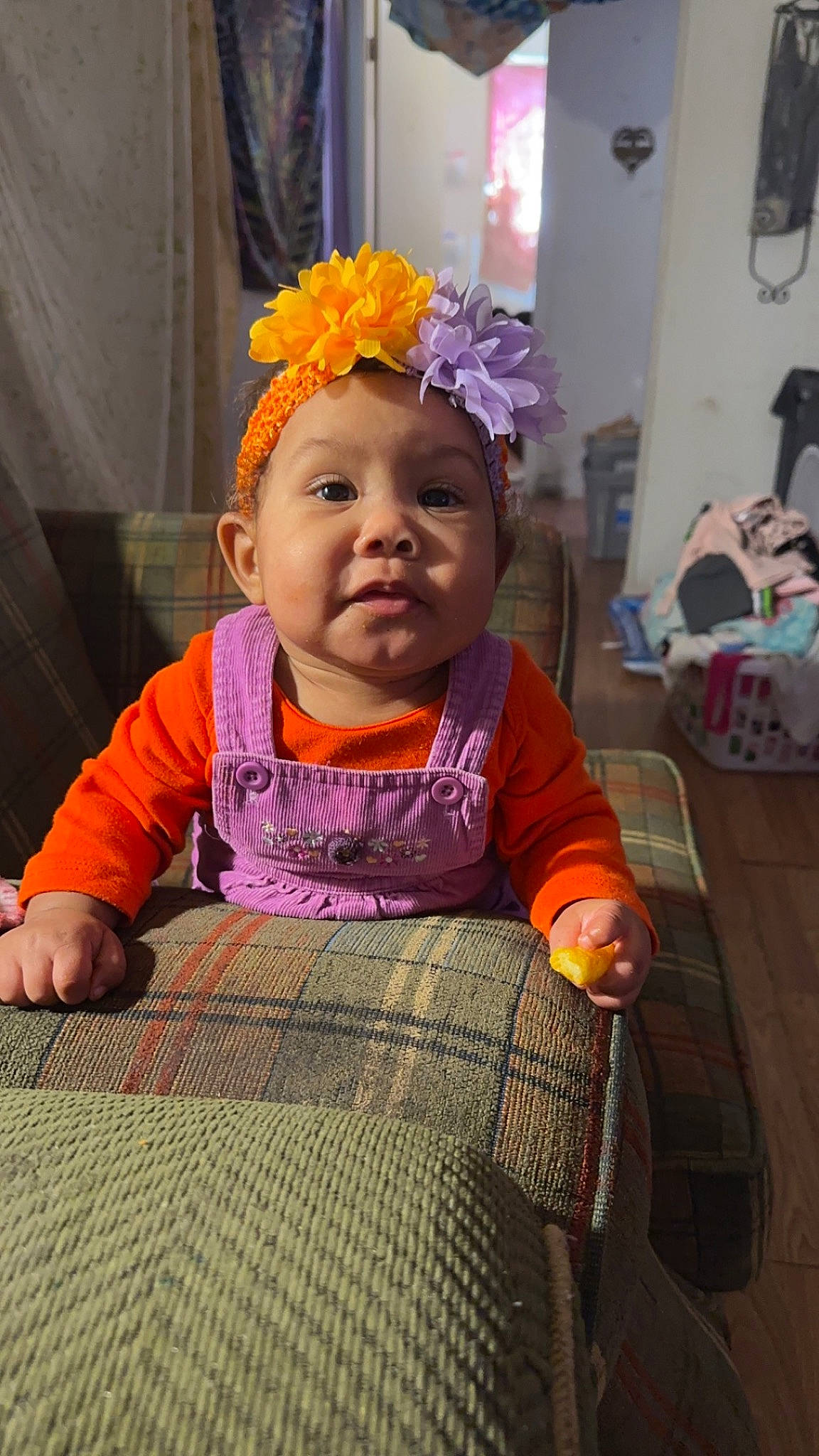 Jordionna joined the competition — help win amazing prizes! baby, baby_products, baby_toddler_clothing, cheek, child, event, facial_expression, fashion_accessory, flooring, flower, fun, happy, headwear, leisure, magenta, person, pink, purple, sitting, skin