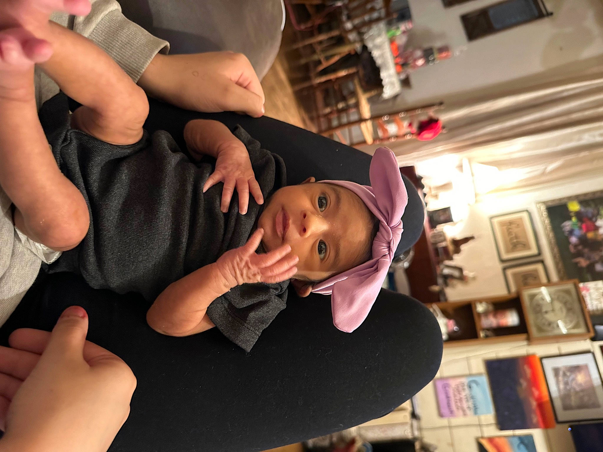 Alana is registered to the contest to win money with this photo: black_hair, cap, child, elbow, event, eyewear, fashion_accessory, fashion_design, fun, gesture, hand, happy, hat, headwear, nail, person, picture_frame, room, sun_hat, t_shirt