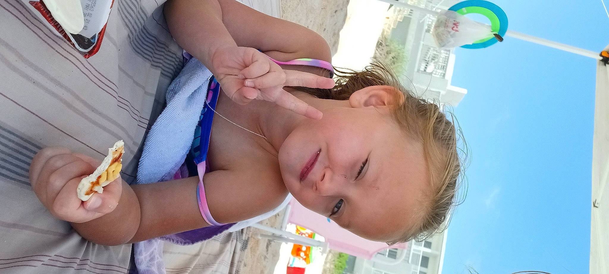 Kennedy joined the competition — help win amazing prizes! chest, eyelash, finger, food, fun, gesture, green, hand, happy, leisure, mouth, nail, nose, person, skin, smile, summer, toddler, water, wrist