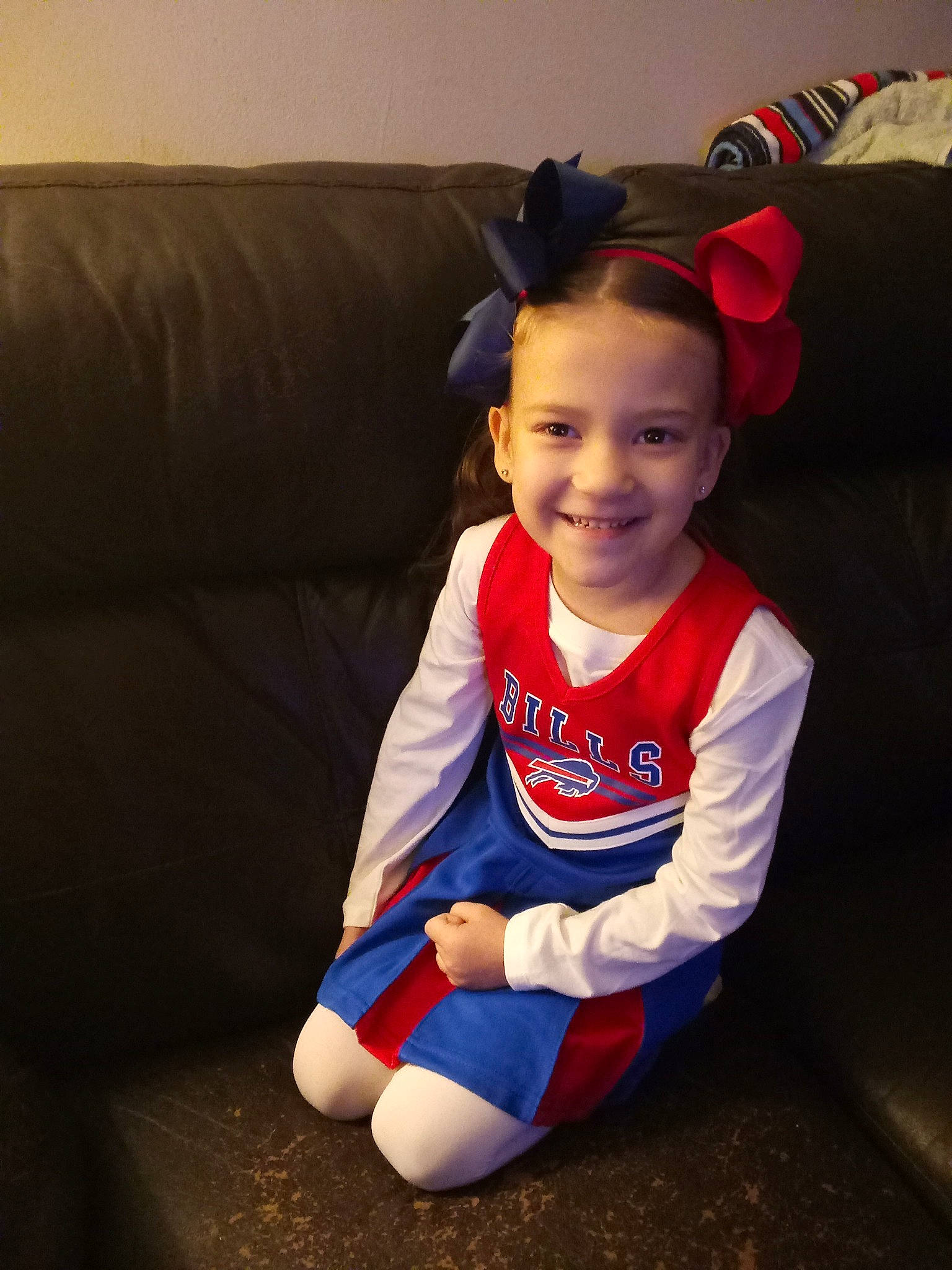 Isabella joined the competition — help win amazing prizes! baby, baby_toddler_clothing, child, comfort, couch, electric_blue, eye, face, fictional_character, flooring, fun, happy, head, human_body, joy, person, sitting, sleeve, smile, sportswear