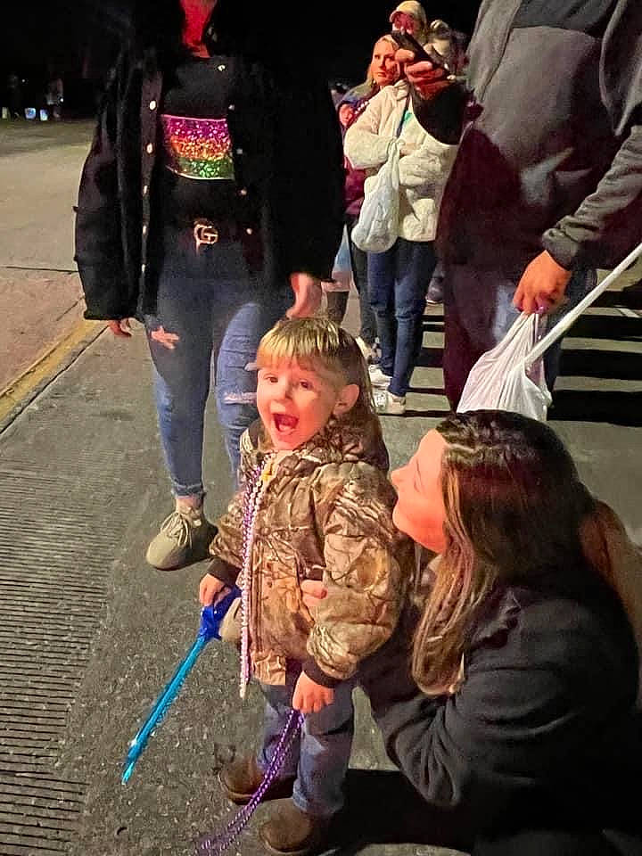 Jaxson joined the competition — help win amazing prizes! boot, child, crowd, event, eyewear, fun, fur, gesture, jacket, jeans, leg, luggage_and_bags, outerwear, pedestrian, person, recreation, snapshot, sneakers, street, toddler