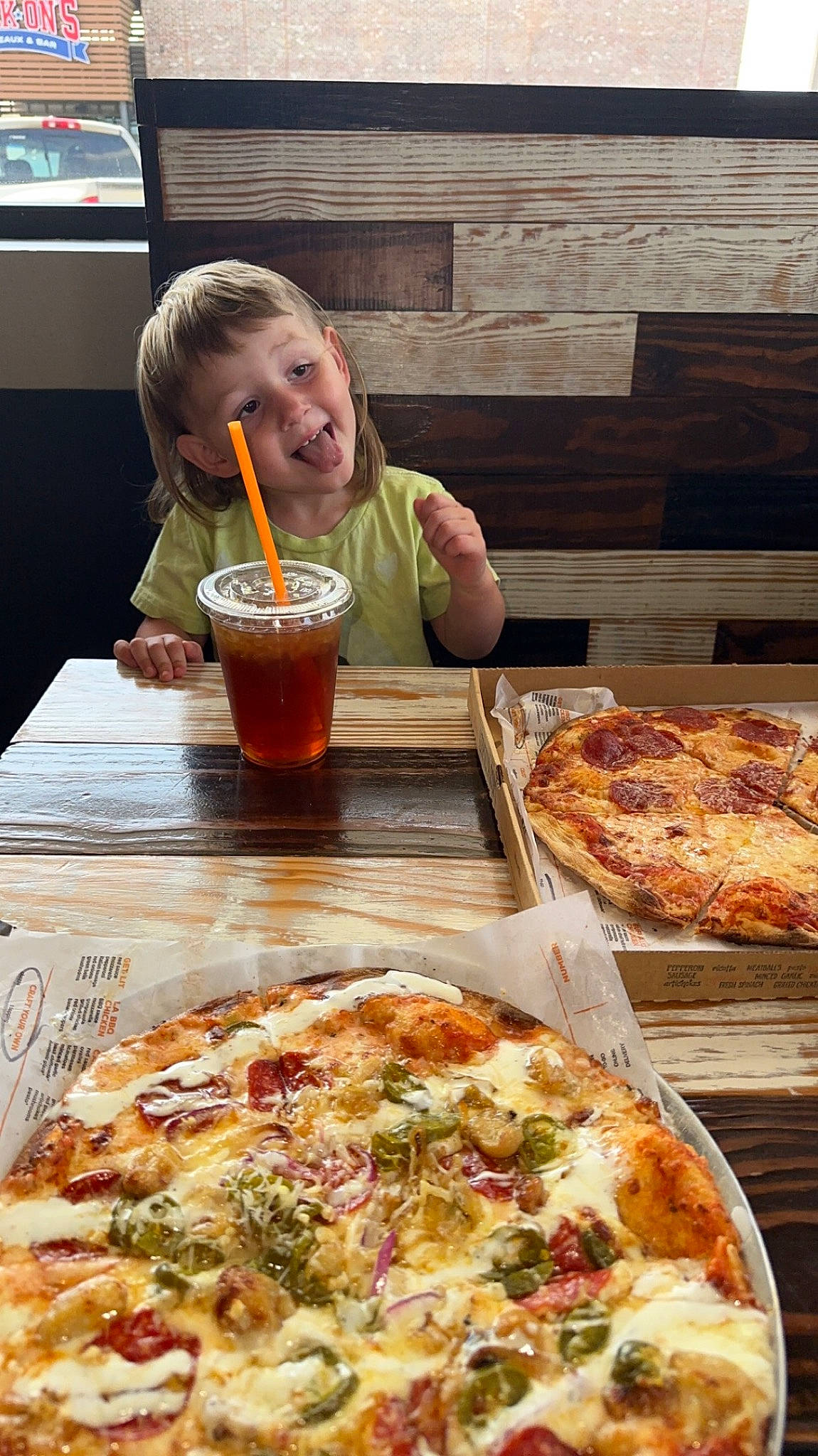 Jaxson joined the competition — help win amazing prizes! baked_goods, beer, california_style_pizza, comfort_food, cuisine, dish, drink, fast_food, flatbread, food, ingredient, meat, person, pizza, pizza_cheese, plate, produce, recipe, smile, table