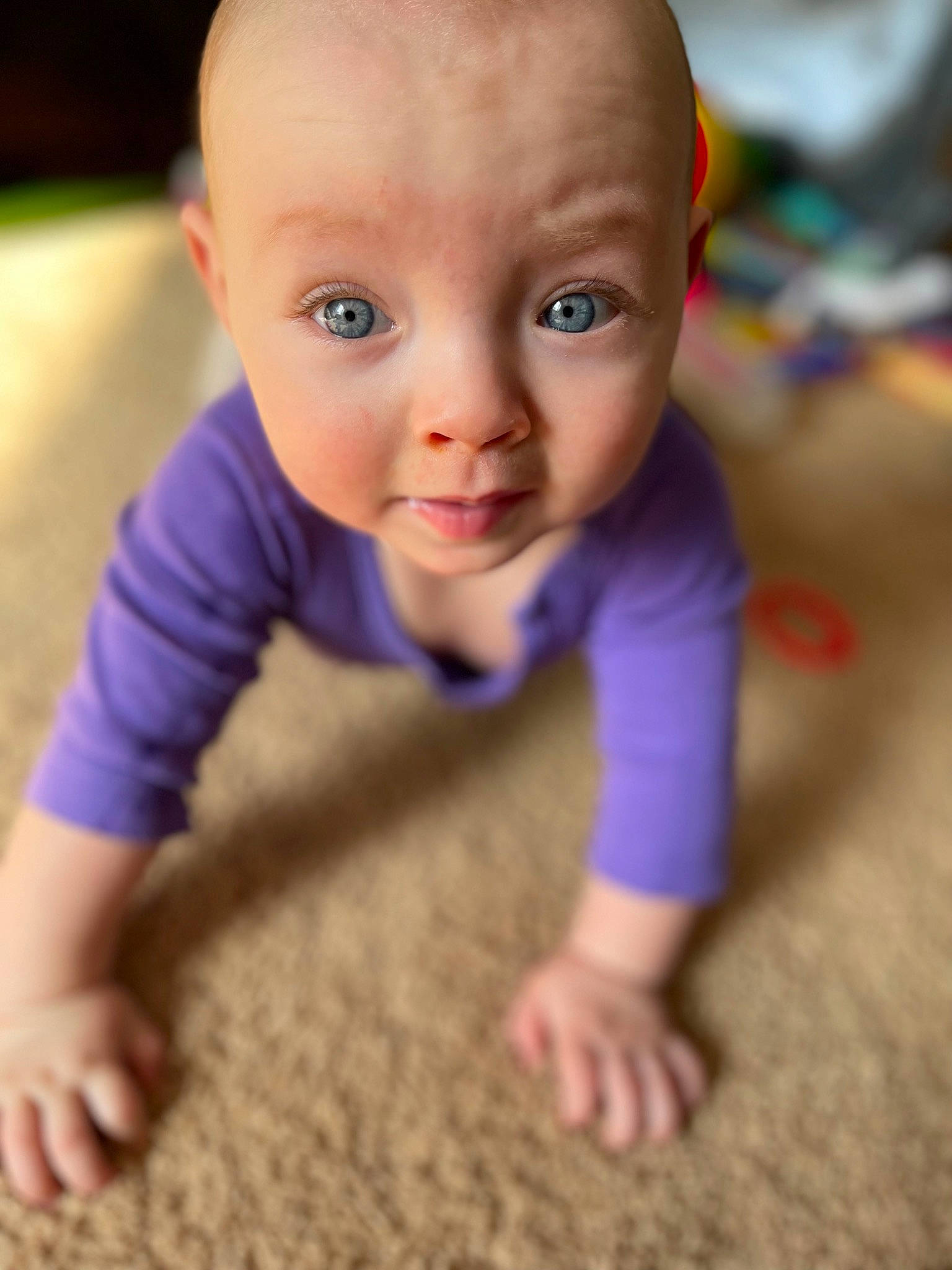 Ruthie joined the competition — help win amazing prizes! baby, baby_crawling, baby_toddler_clothing, cheek, crawling, finger, floor, flooring, fun, gesture, grass, hand, human_body, iris, mammal, nose, person, skin, thumb, toddler