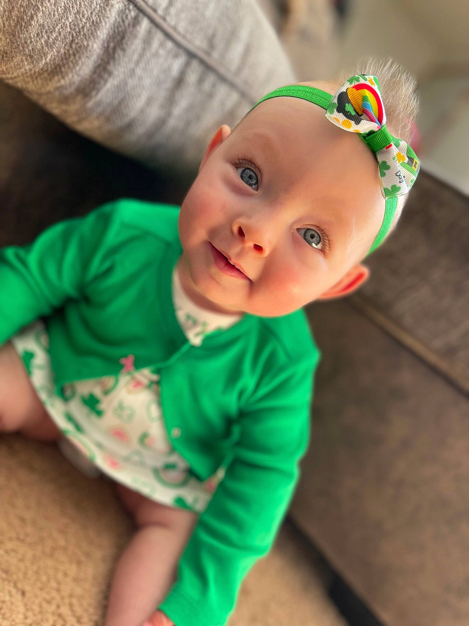 Ruthie joined the competition — help win amazing prizes! baby, baby_toddler_clothing, cheek, child, dress, flooring, fun, grass, happy, hat, holiday, person, portrait_photography, sitting, skin, sleeve, smile, toddler, tree, wood