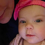 Allison Lynn Garrett joined the competition — help win amazing prizes! baby, child, face, headband, pink, bow, closeup, portrait, infant, person, skin, eyes, mouth, clothing, cute, expression, adult, partial_face, indoor, soft_lighting