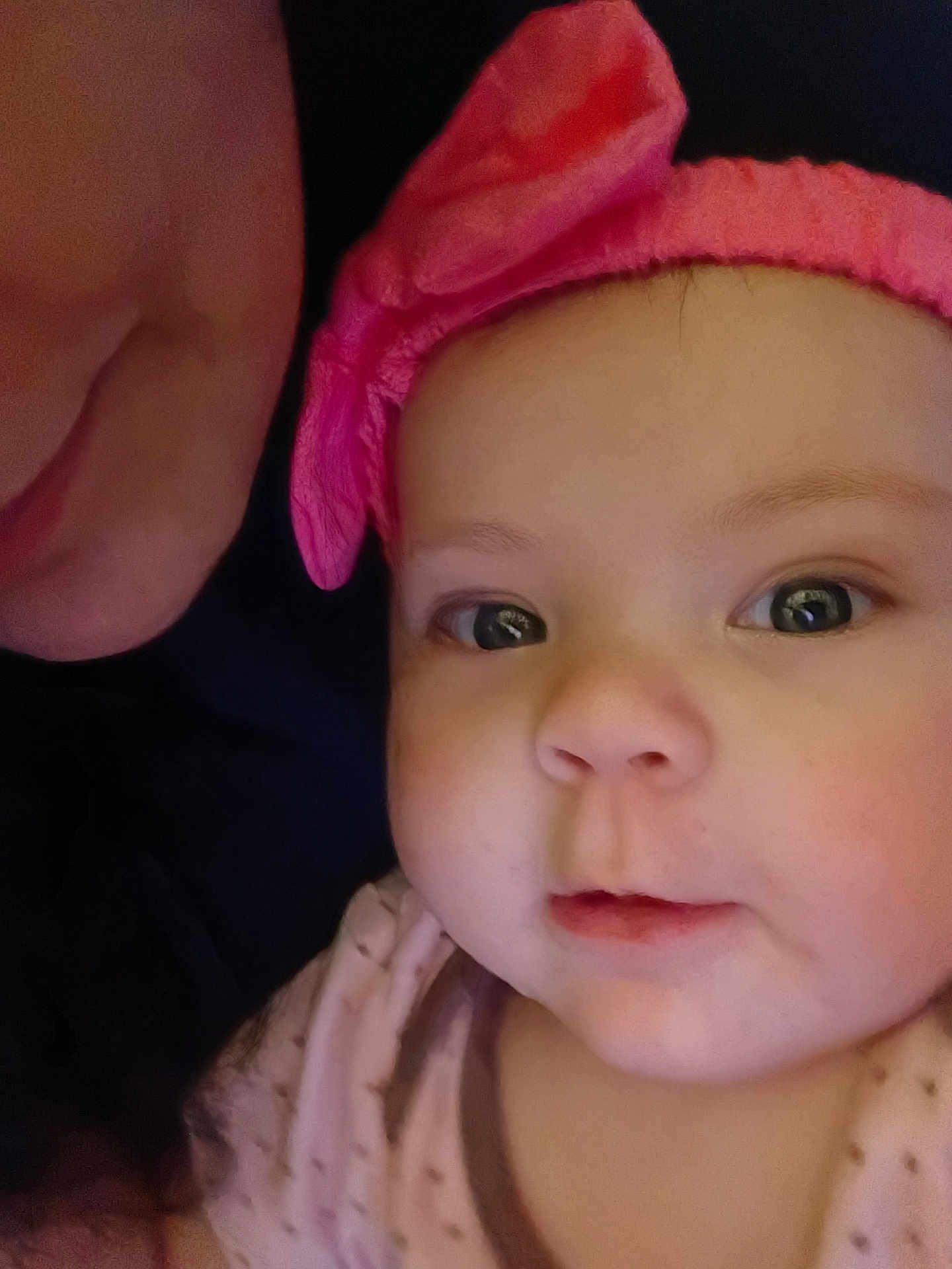 Allison Lynn Garrett joined the competition — help win amazing prizes! baby, child, face, headband, pink, bow, closeup, portrait, infant, person, skin, eyes, mouth, clothing, cute, expression, adult, partial_face, indoor, soft_lighting