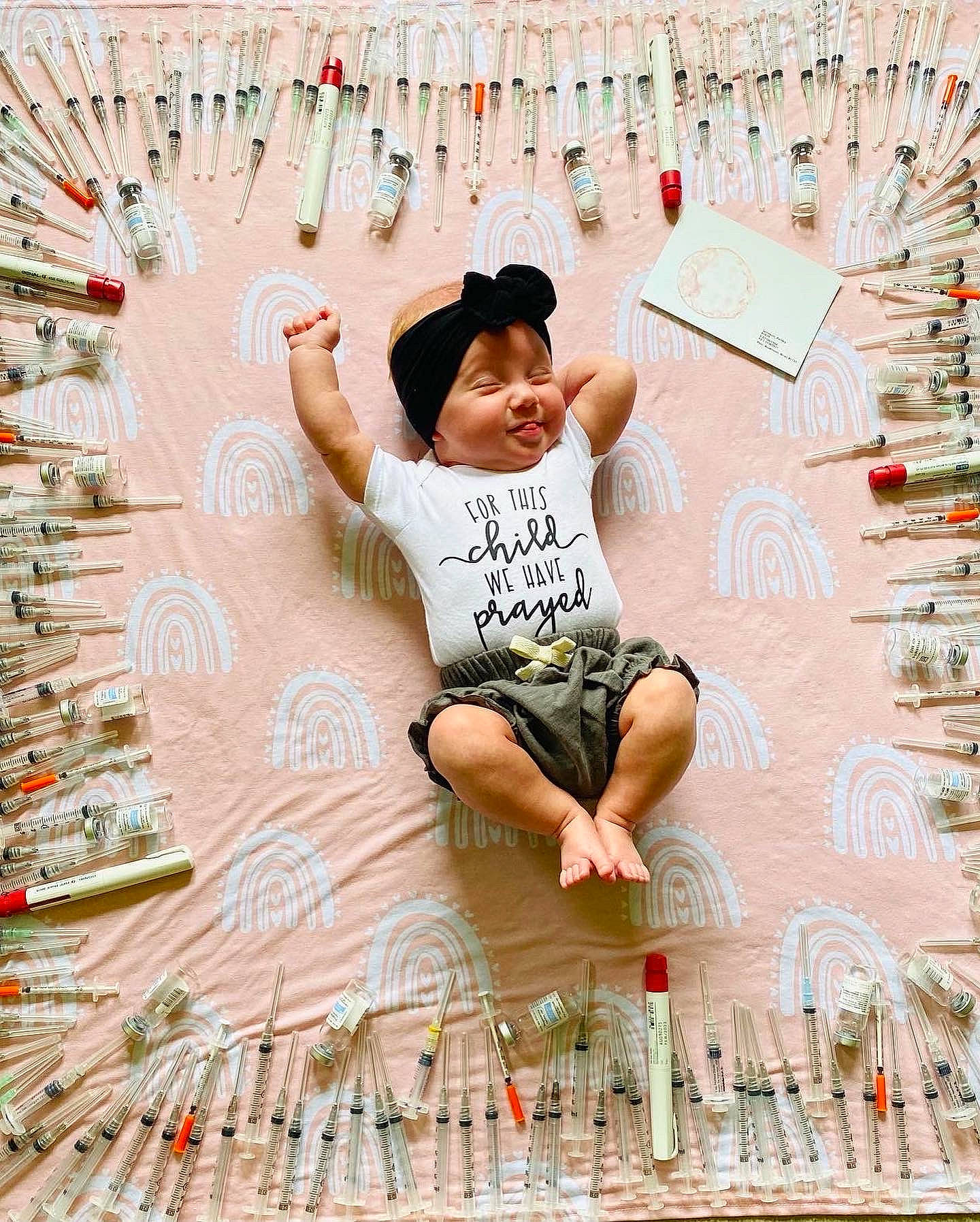 Jayla joined the competition — help win amazing prizes! barefoot, child, flooring, font, foot, fun, happy, headwear, human_leg, leg, leisure, organ, pattern, person, play, recreation, shorts, sitting, t_shirt, toddler