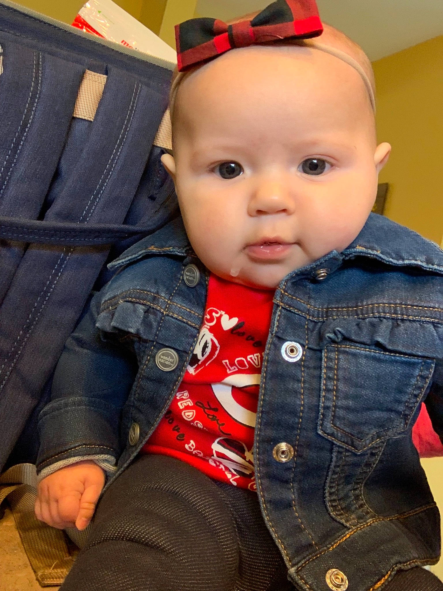 Penelope is registered to the contest to win money with this photo: baby, cheek, child, child_model, denim, jeans, person, sitting, skin, standing, textile, toddler