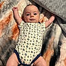 Grayson is registered to the contest to win money with this photo: baby, bed, bedroom, blanket, bodypart, face, finger, furniture, hand, happy, head, indoors, newborn, person, photography, portrait, quilt, room, sitting, smile