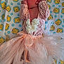 Ashlee is registered to the contest to win money with this photo: baby, infant, pink_clothing, lace, tutu, blanket, winnie_the_pooh, cartoon_pattern, lying_down, newborn, cute, small_hands, sleepwear, soft_fabric, toddler, child, face, person, bed, resting