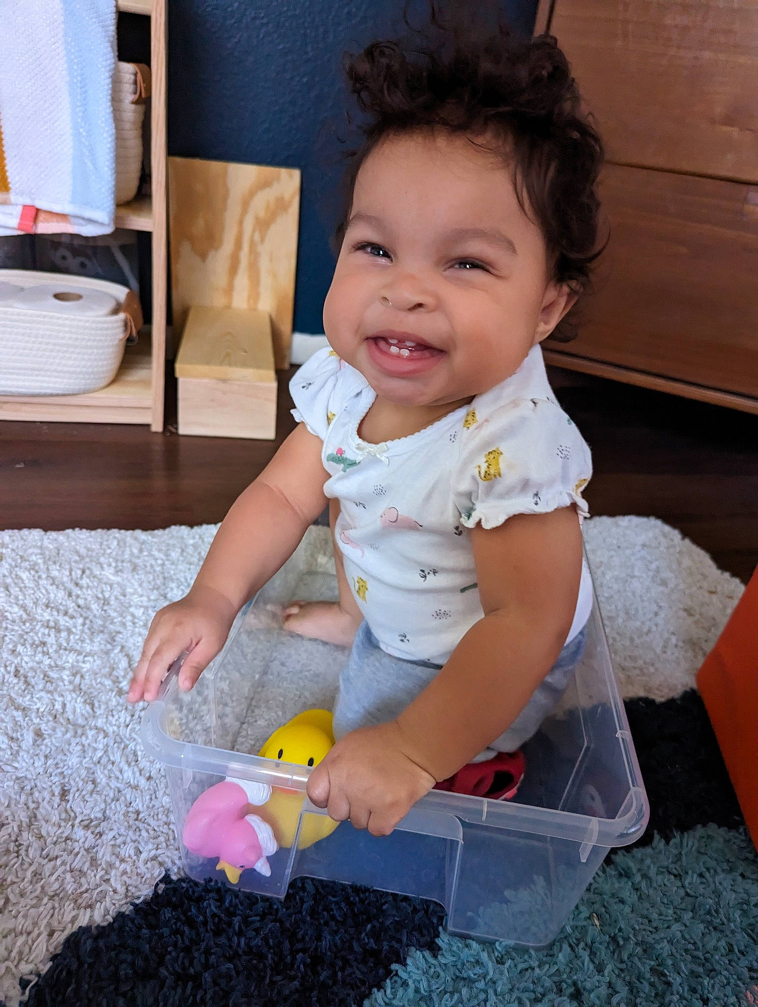 Amaya joined the competition — help win amazing prizes! baby, baby_toddler_clothing, cheek, child, finger, floor, flooring, fun, happy, nail, person, plastic, play, sitting, smile, thumb, toddler, wood