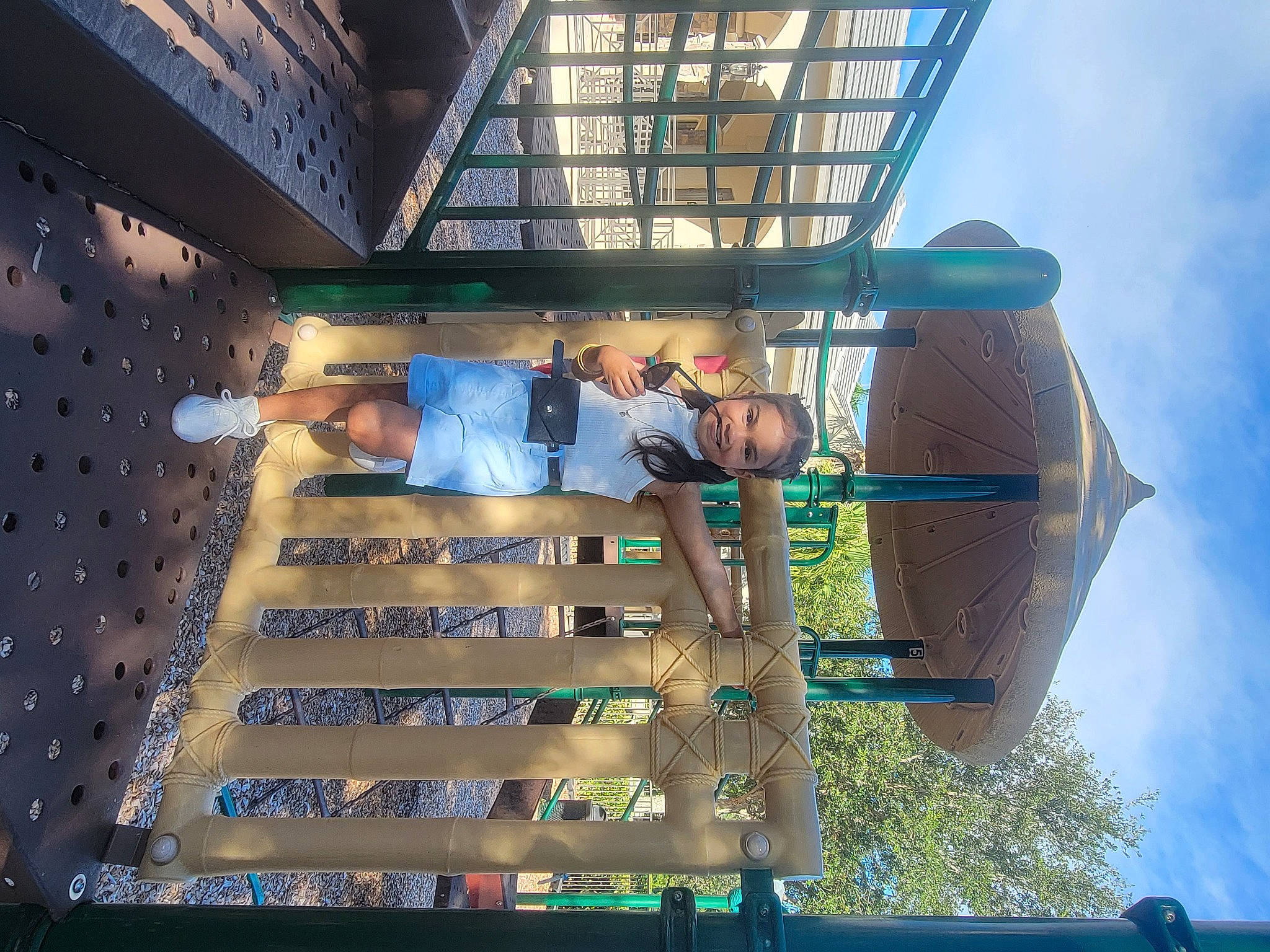 Selena Abdulaziz joined the competition — help win amazing prizes! blue, building, city, commercial_building, condominium, event, facade, fun, joy, leisure, light, metropolitan_area, mixed_use, person, reflection, sky, stairs, symmetry, tower, tree