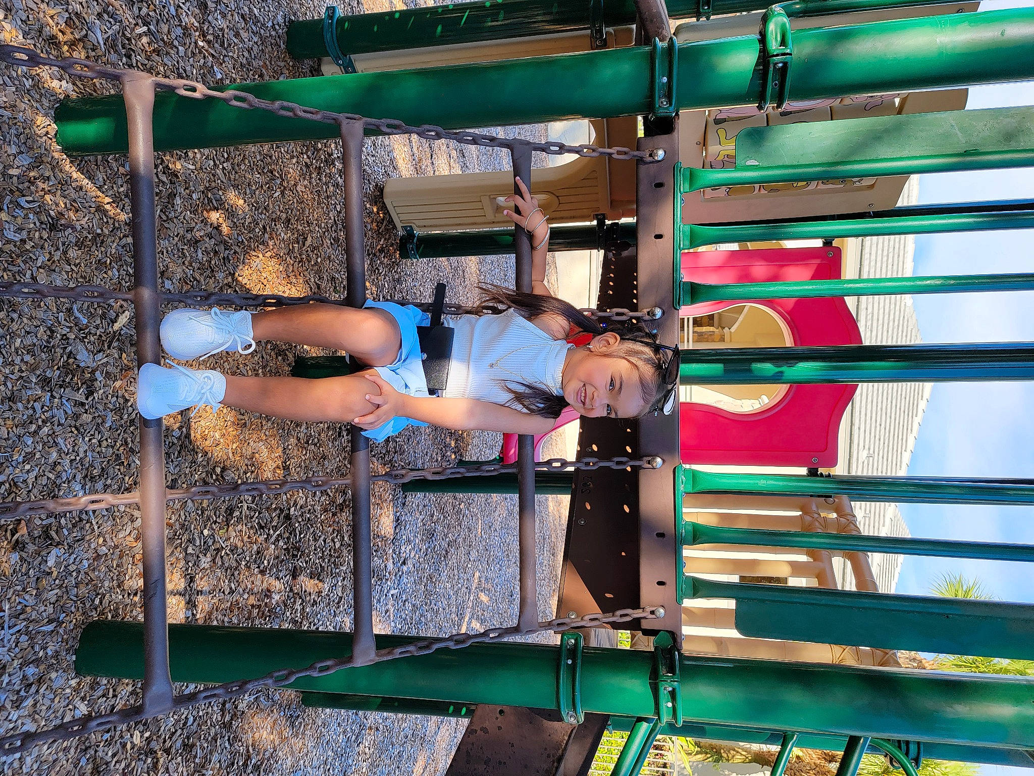 Selena Abdulaziz is registered to the contest to win money with this photo: balance, calf, elbow, electric_blue, fun, human_leg, joy, knee, leg, leisure, lumber, metal, person, physical_fitness, shorts, t_shirt, thigh, vacation, wood