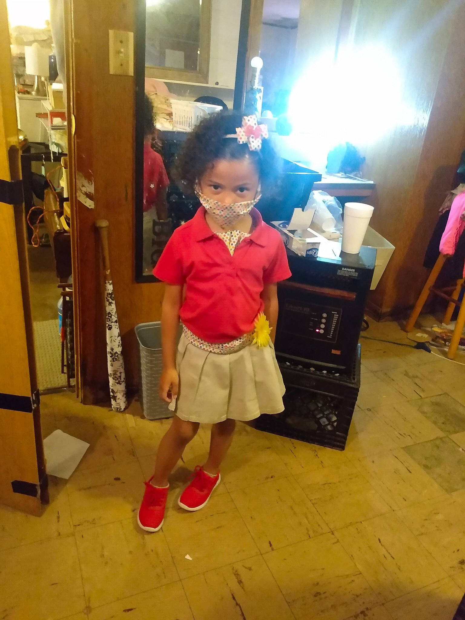 Jaislyn is registered to the contest to win money with this photo: bag, cabinetry, chest_of_drawers, child, door, drawer, event, eyewear, fashion_design, floor, flooring, fun, human_leg, luggage_and_bags, magenta, person, room, standing, toddler, waist