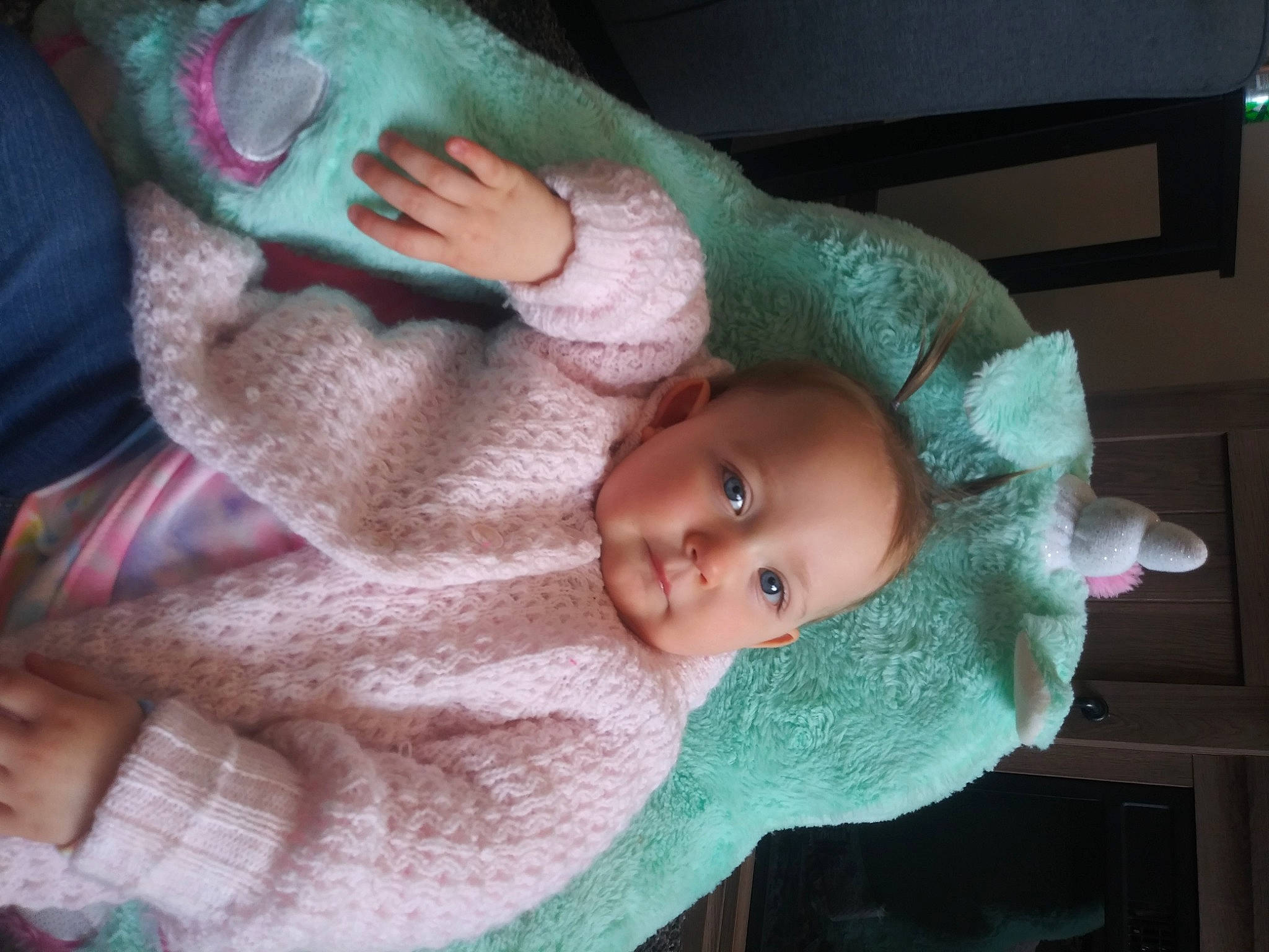 Katherine is registered to the contest to win money with this photo: baby, baby_products, baby_toddler_clothing, bonnet, cheek, child, comfort, green, headgear, iris, knit_cap, lip, nose, person, pink, skin, textile, toddler, tree, wool