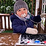 Louis participe au concours pour gagner de l'argent avec cette photo : baby, child, cold_weather, cozy, cute, greenery, hat, mittens, outdoor, pacifier, person, playhouse, portrait, scarf, smiling, snow, toddler, toy_kitchen, winter_clothing, wooden_structure