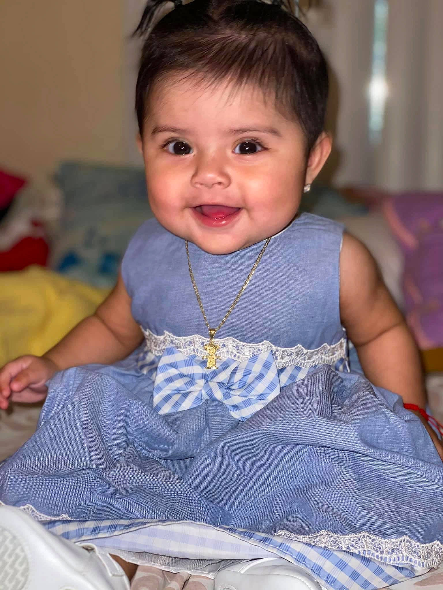 Daniela joined the competition — help win amazing prizes! baby, beauty, cheek, child, dress, eye, face, facial_expression, iris, joy, lip, people, person, sitting, skin, smile, toddler