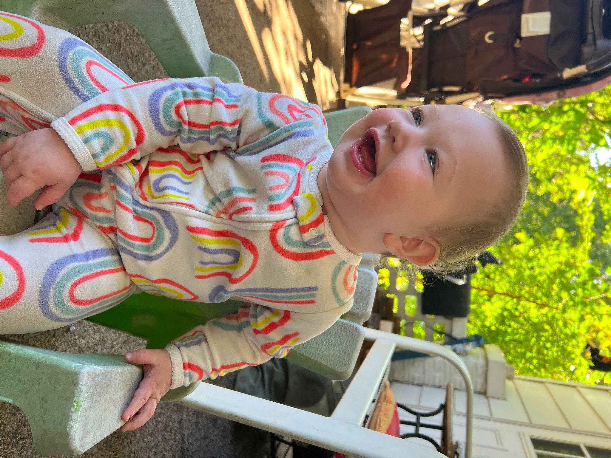 Eden joined the competition — help win amazing prizes! baby, child, city, facial_expression, foot, fun, happy, leisure, person, play, recreation, sitting, smile, toddler, tree, vacation