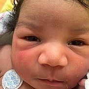 Stori is registered to the contest to win money with this photo: baby, blanket, child, closeup, cute, electrodes, face, hair, healthcare, hospital, infant, medical, newborn, newborn_baby, person, portrait, resting, skin, small, toddler