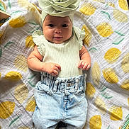 Yasliet joined the competition — help win amazing prizes! baby, infant, child, smiling, headband, flower, mint_green, top, ruffles, jeans, light_blue, socks, blanket, lemon_pattern, fabric, cute, portrait, indoors, lying_down, soft_lighting