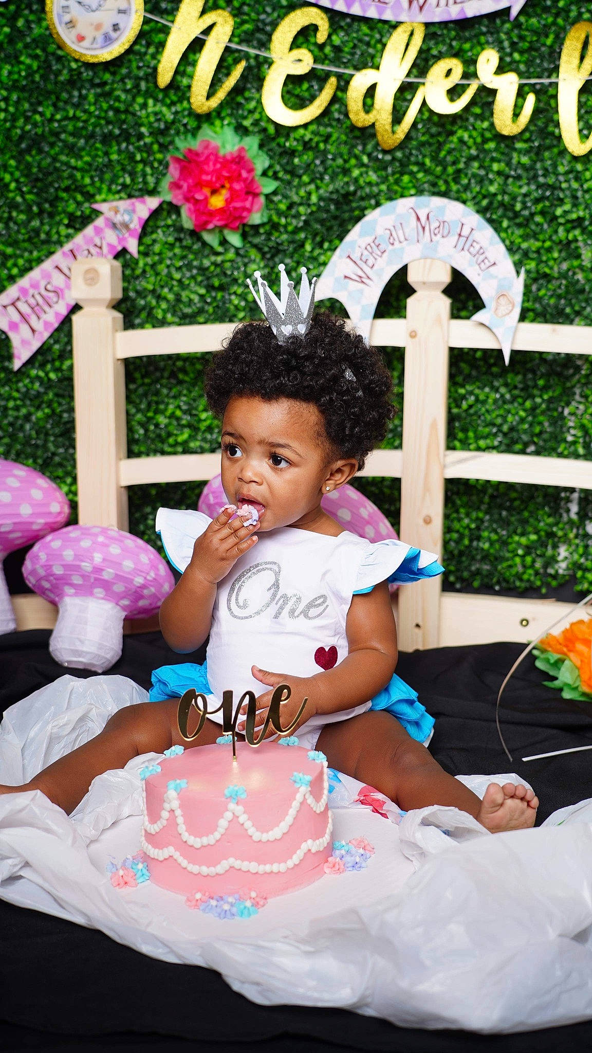 Emery is registered to the contest to win money with this photo: baby, baby_toddler_clothing, chair, child, event, fun, grass, happy, leisure, magenta, person, pink, plant, play, product, recreation, shorts, sitting, spring, t_shirt