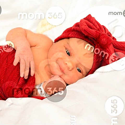 Susannah joined the competition — help win amazing prizes! baby, bow, child, cute, eyes, face, hand, headband, indoors, infant, lying_down, newborn, portrait, red_clothing, resting, skin, smile, soft, watermark, white_blanket