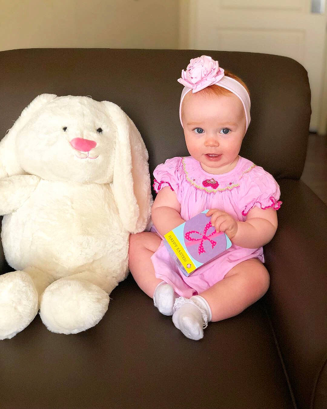 Carolina joined the competition — help win amazing prizes! baby, cheek, child, ear, face, happy, head, people, person, pink, play, plush, room, sitting, skin, smile, stuffed_toy, teddy_bear, textile, toddler