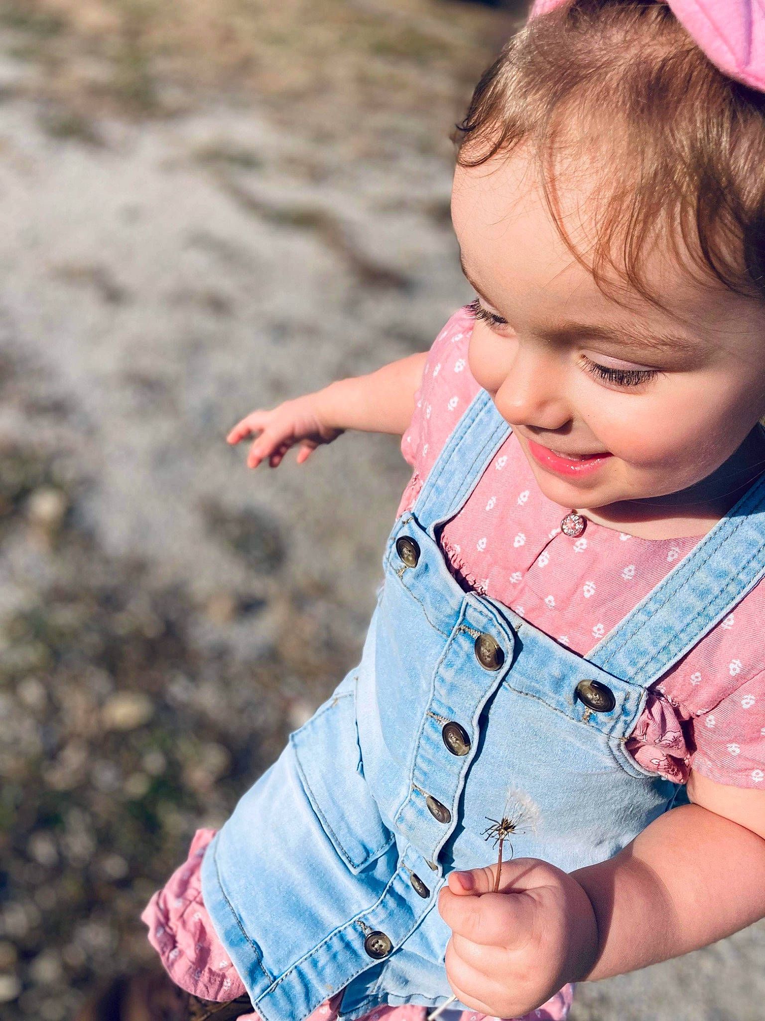 Aspen joined the competition — help win amazing prizes! baby_toddler_clothing, cheek, dress, eye, face, finger, gesture, grass, hairstyle, hand, happy, iris, lip, people_in_nature, person, photograph, pink, skin, sleeve, smile