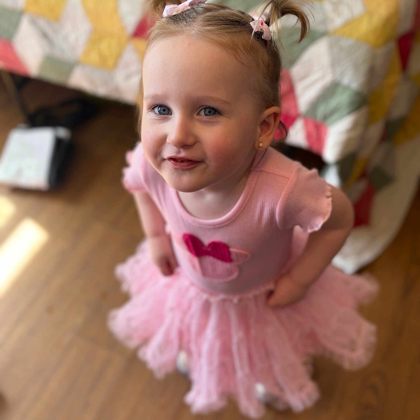 Rosalie joined the competition — help win amazing prizes! accessories, bodypart, child, clothing, couch, dancing, dress, face, female, finger, formalwear, furniture, girl, hand, hardwood, head, person, photography, portrait, wood