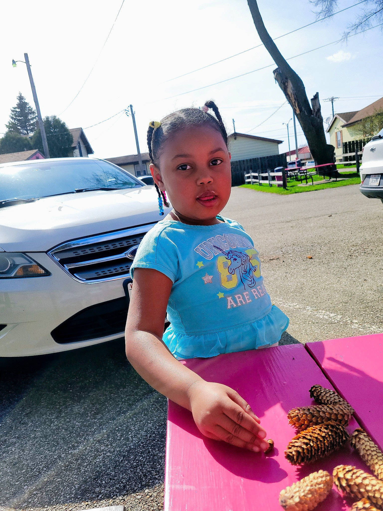 Lydia joined the competition — help win amazing prizes! asphalt, automotive_design, automotive_exterior, automotive_lighting, automotive_tire, bumper, car, electric_blue, grille, hood, land_vehicle, leg, leisure, mid_size_car, motor_vehicle, person, personal_luxury_car, sky, tire, vehicle